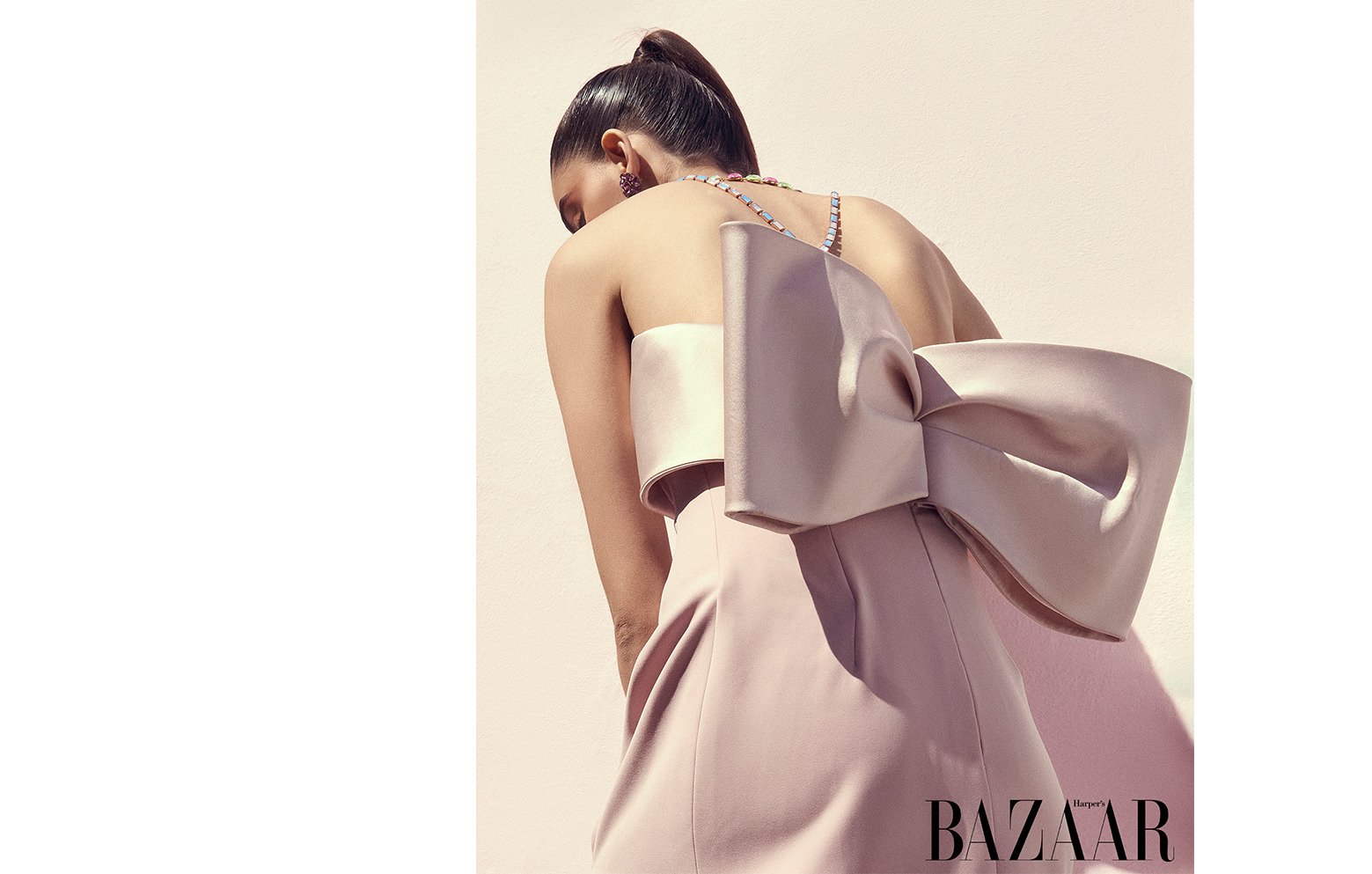  Sabrina dances through the West London streets with falling spring blossoms in hues of pink for Harpers Bazaar,   