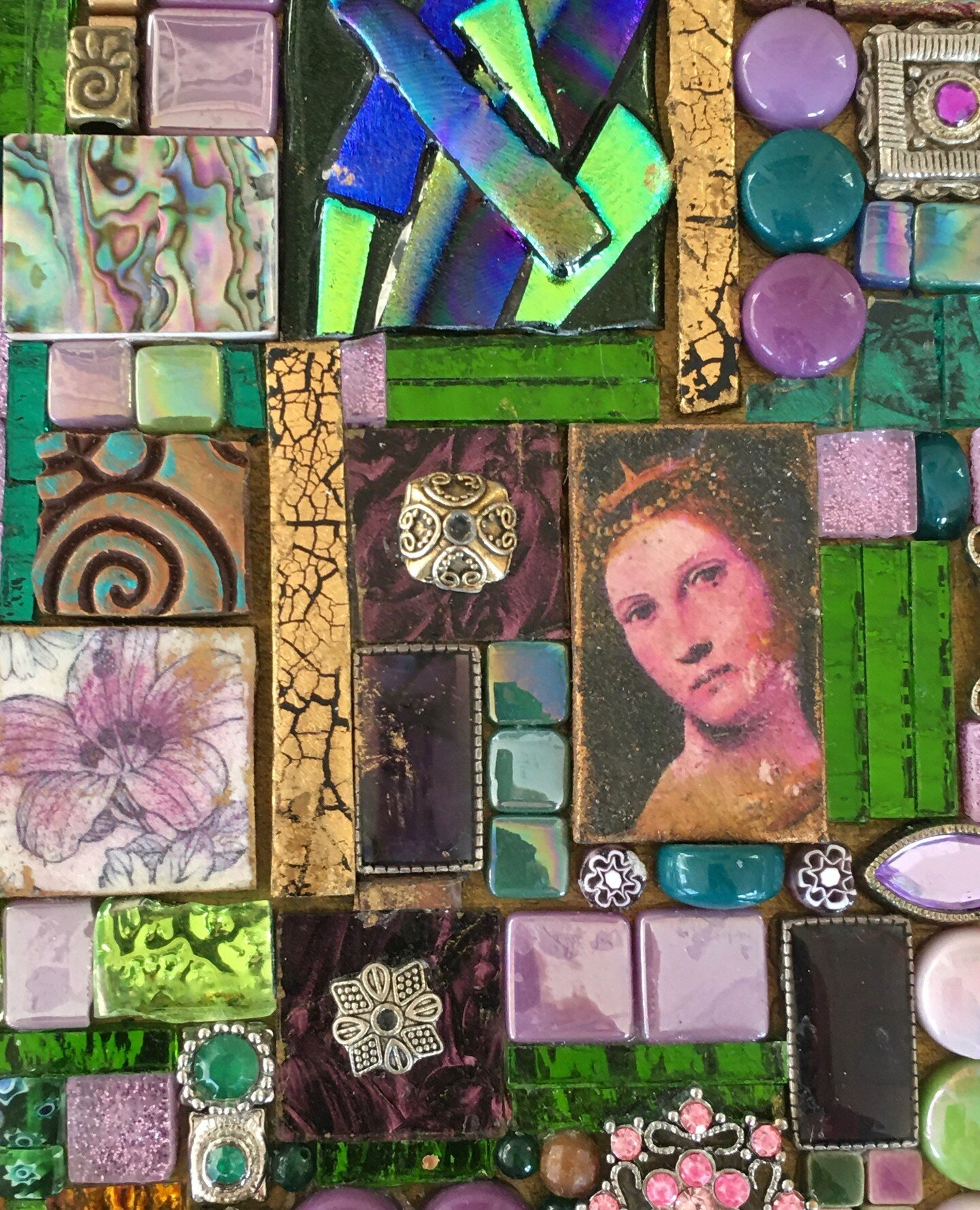 Had bits and pieces left over from projects and decided to put them together in a mixed media mosaic. This closeup of a portion of a larger piece includes fused glass, stamped and colored polymer clay, image transfers on polymer clay, gold leaf on po