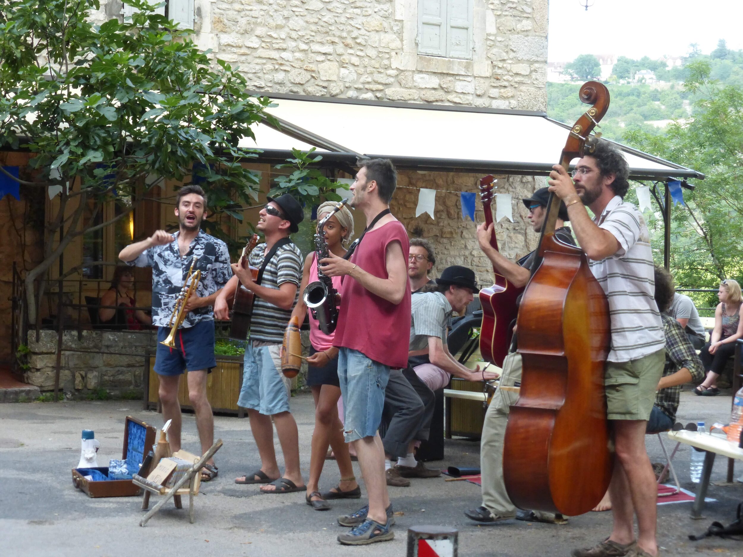 Enjoying the street musicians in Rocamadour