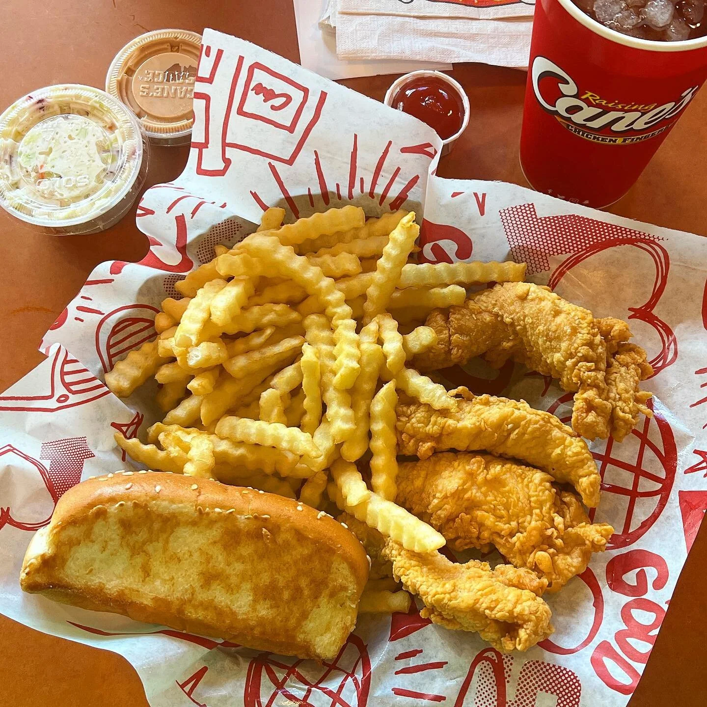 Road trips are a great opportunity to try things we don&rsquo;t have at home. #raisingcanes did not disappoint, but it&rsquo;s probably not the best thing to eat when you still have 5 hours of sitting in a car!
.
.
.
.
.
#raisingcanes #chickenfingers