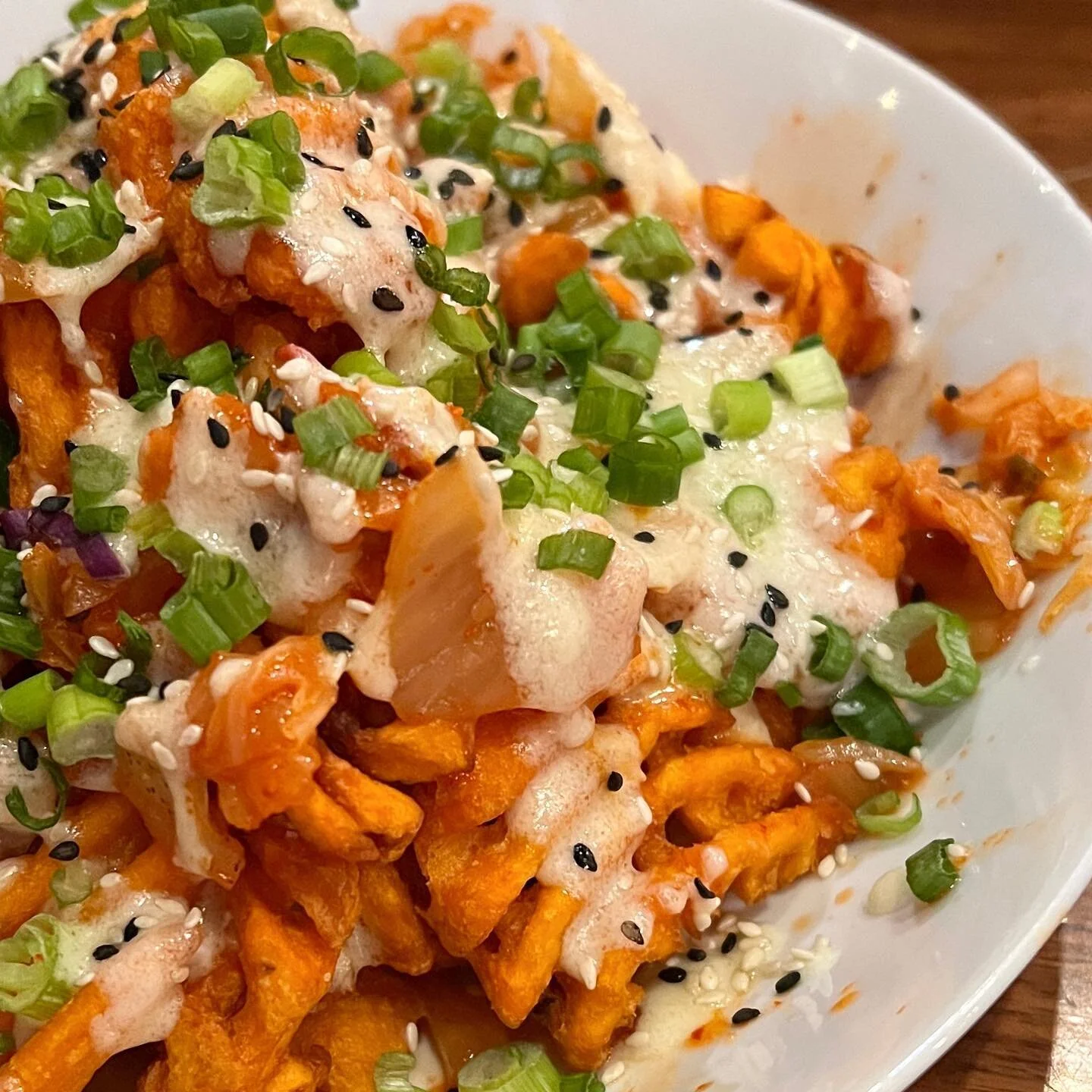 To be honest, I love kimchee with just about anything. But piled on top of waffle fries might be my favorite. 
.
.
.
.
#kimchee #sweetpotatofries #wood.ear.telluride #tastetelluride #eatercolorado #jphamfoodguide