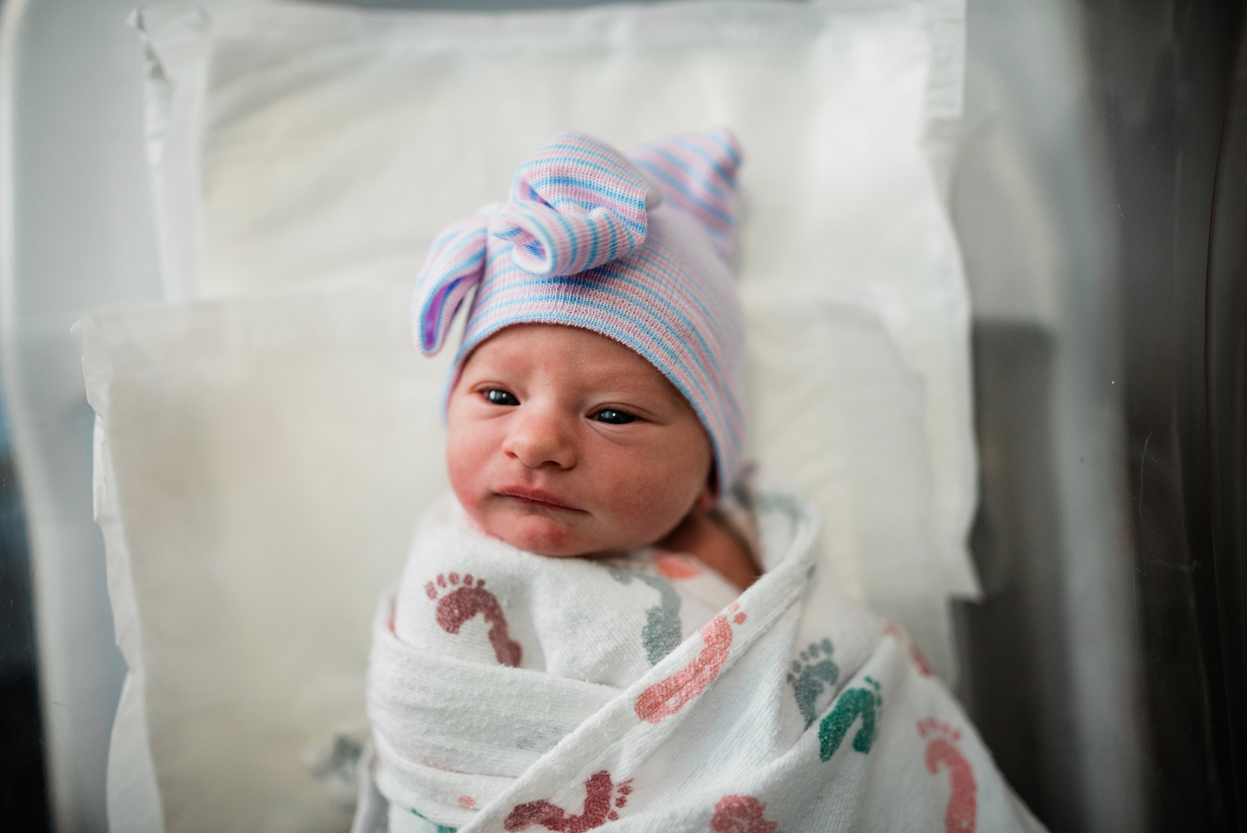 Newborn baby swaddled in her bassinet at Piedmont Atlanta 