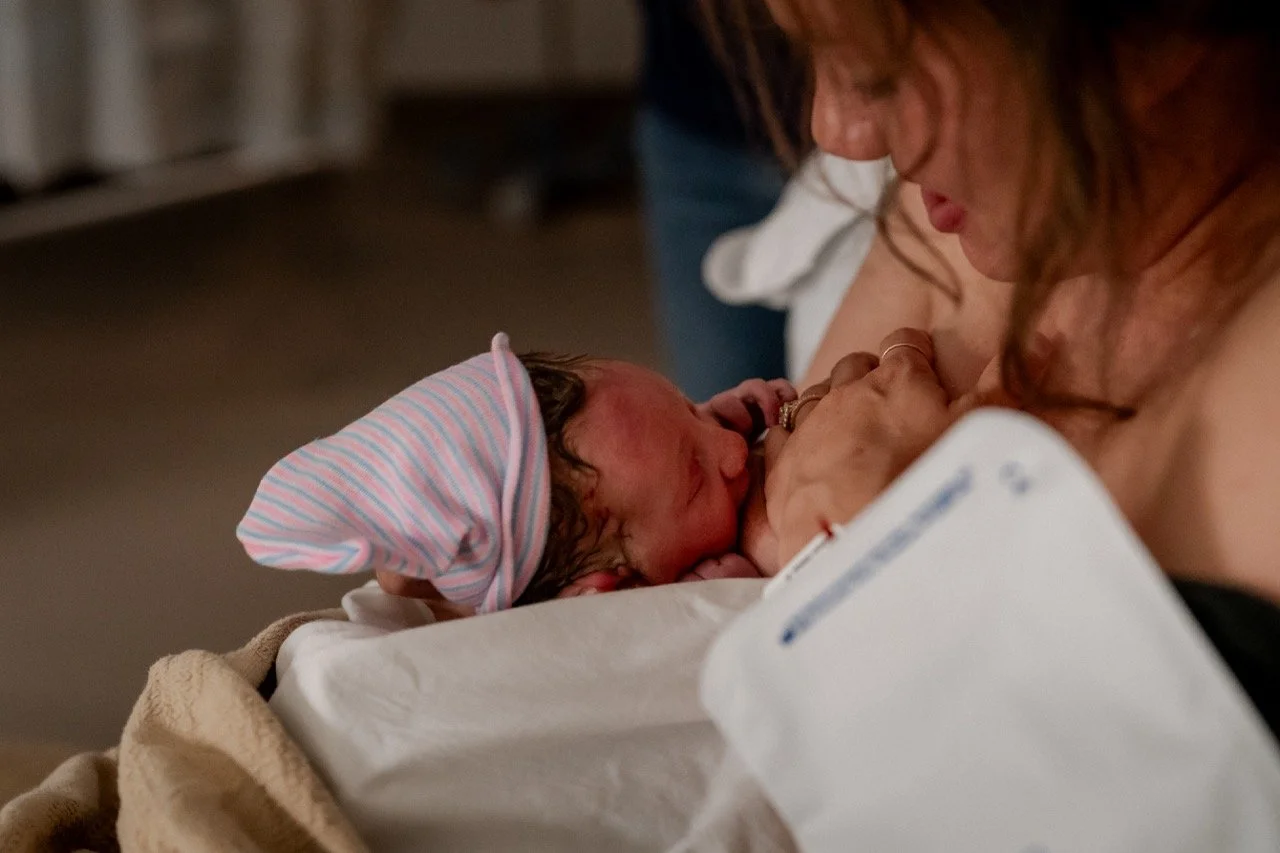 Newborn baby breastfeeding