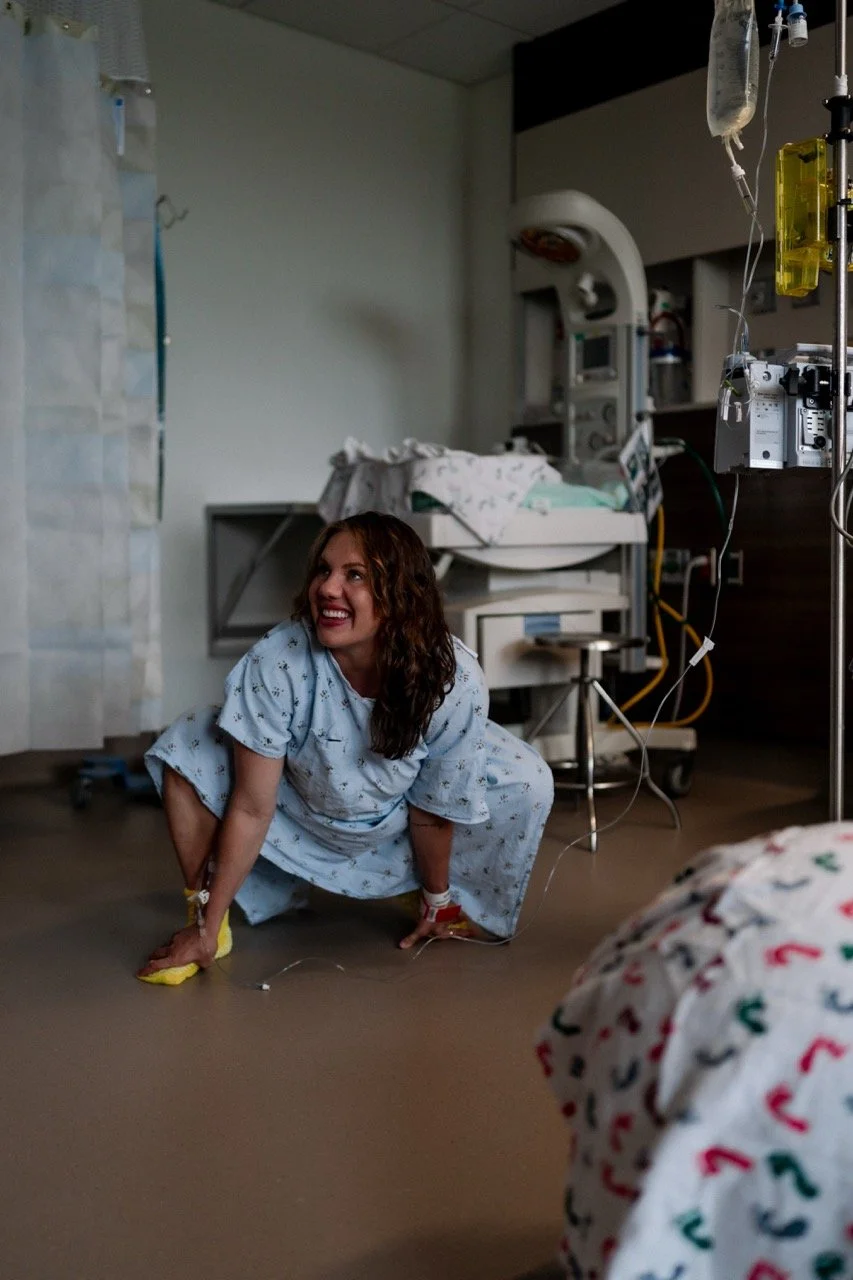 Mother squatting in labor at Piedmont Hospital Atlanta