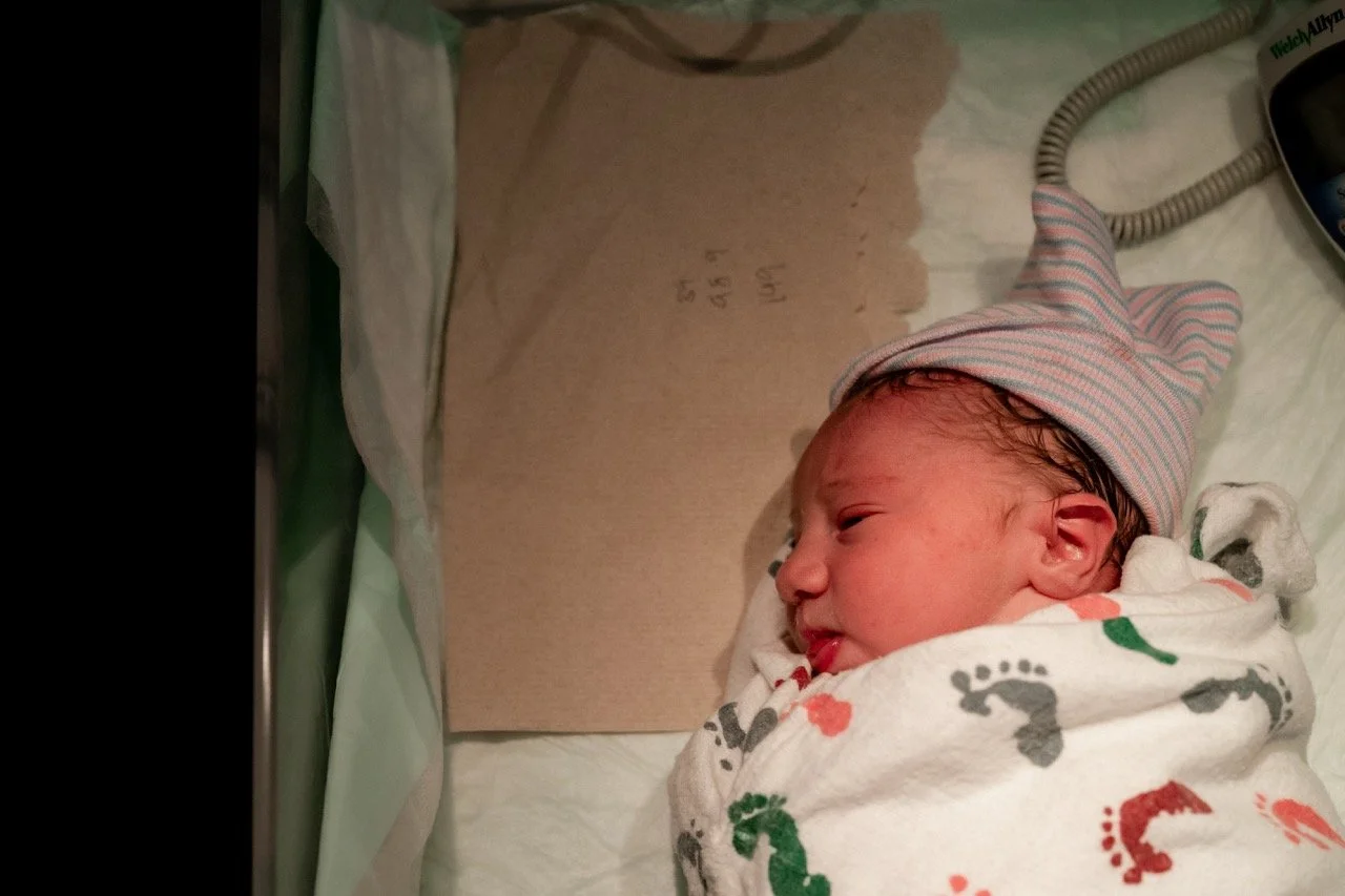 Newborn baby swaddled in the hospital warmer