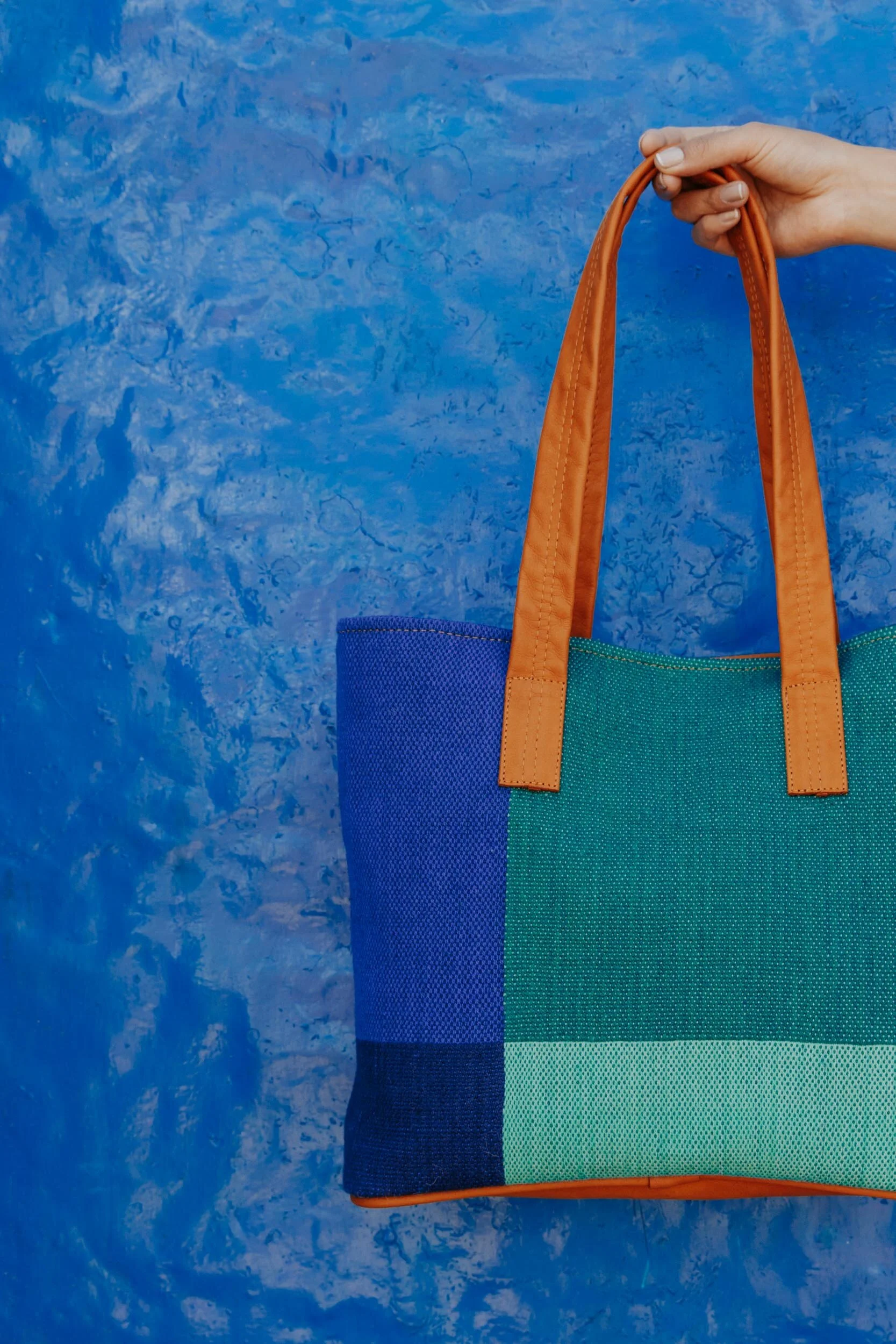 blue and teal wool and leather tote bag