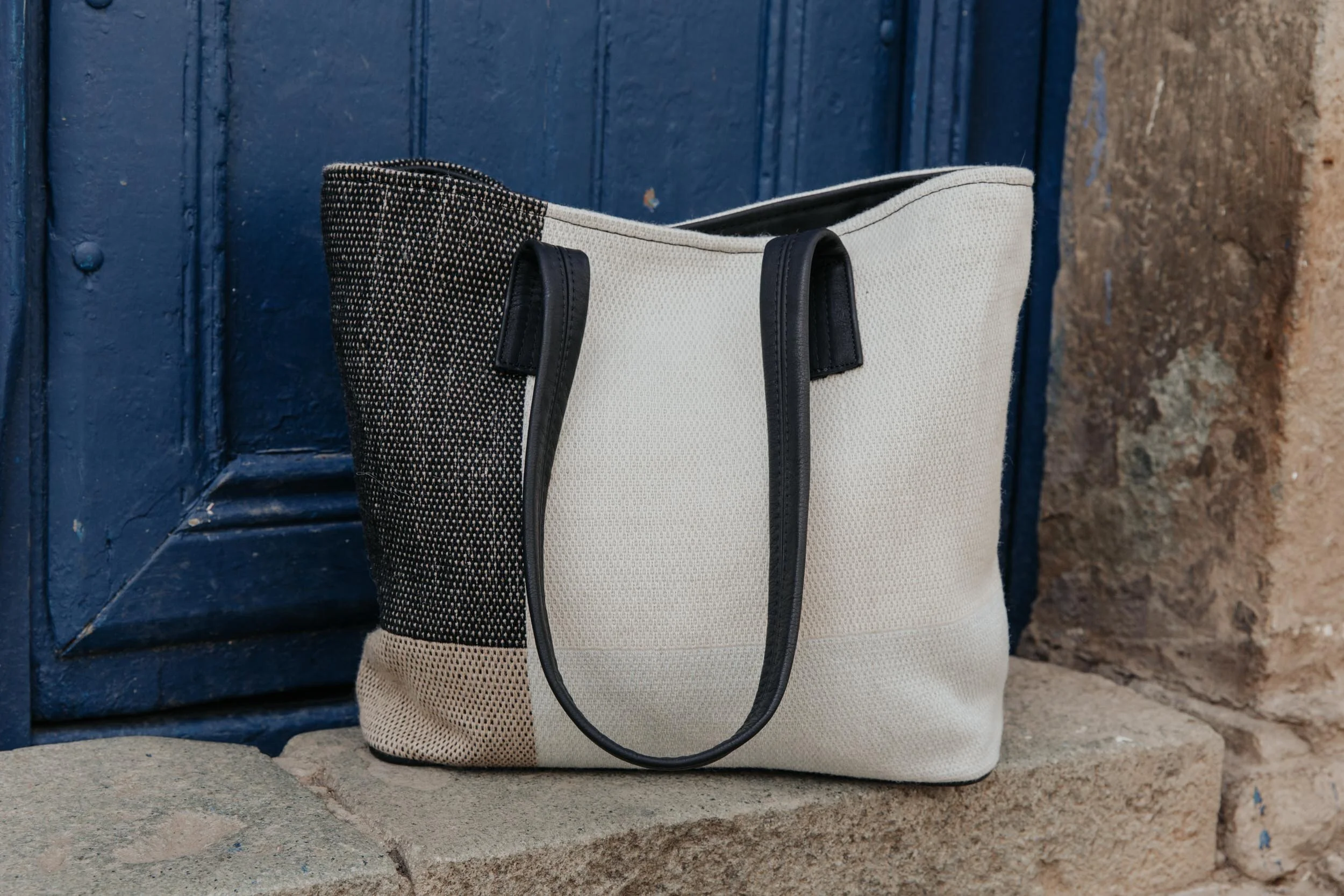 handwoven and leather black and white tote bag
