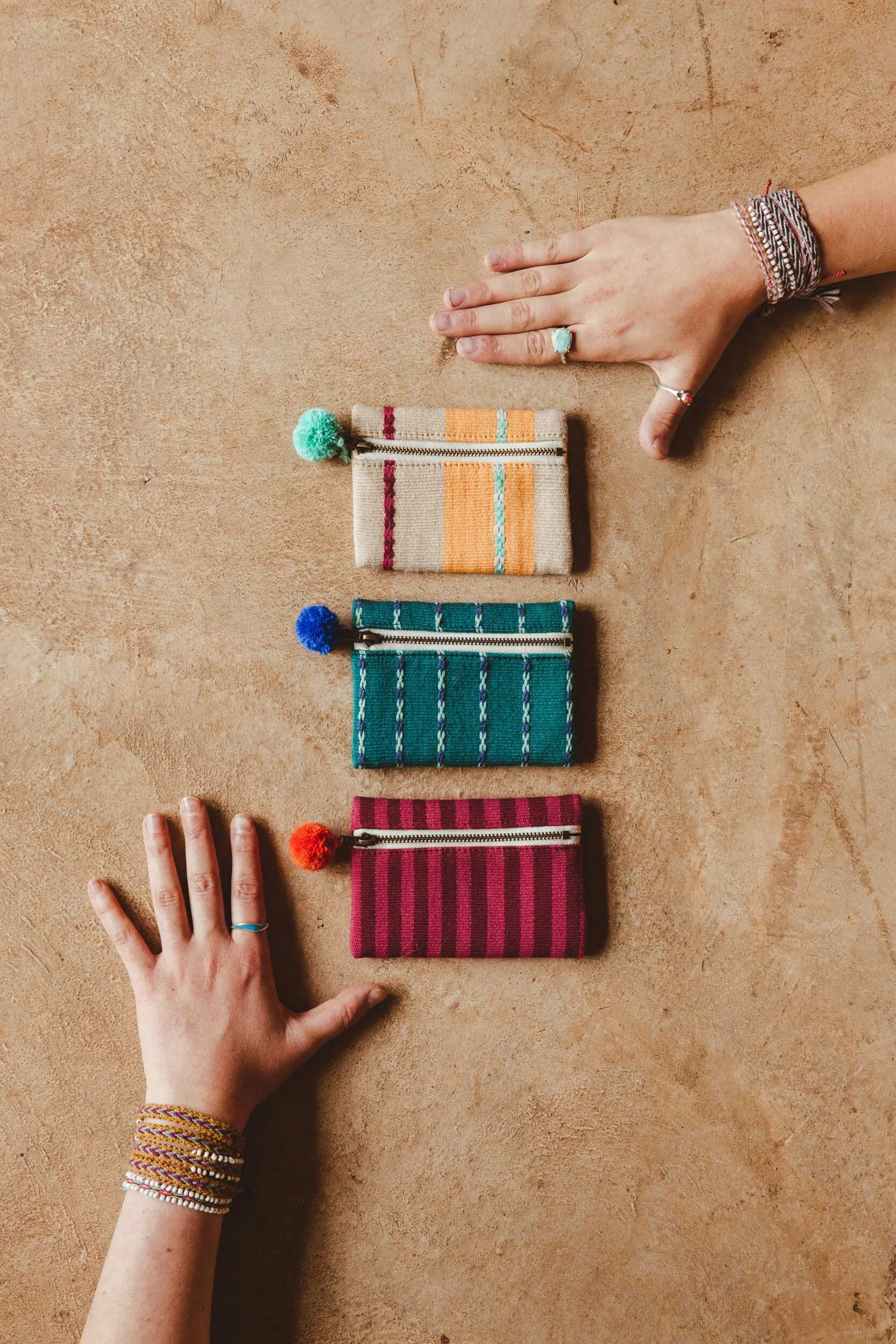 coin purses with pompoms