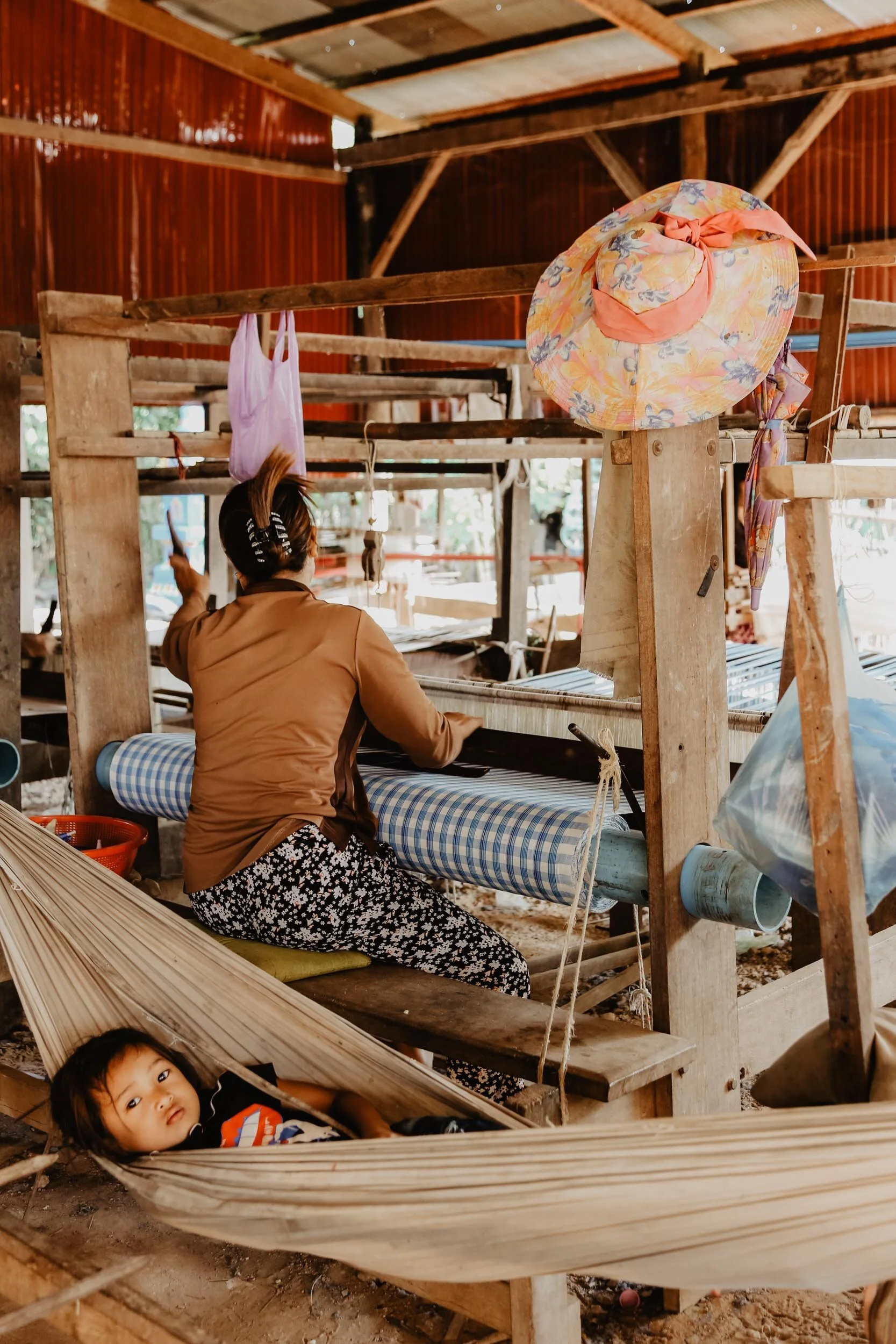weaving on the loom in cambodia