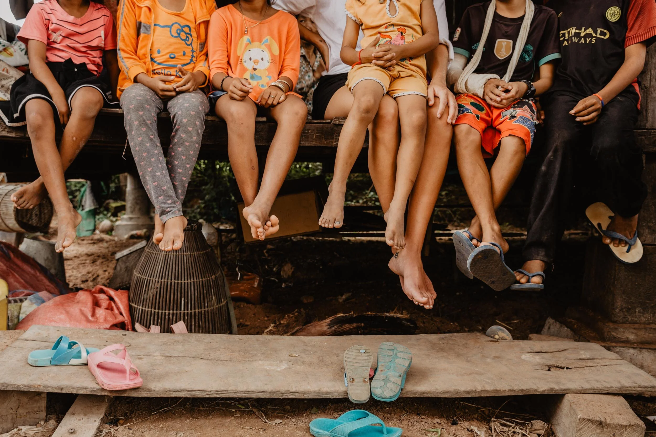 children's legs and feet hanging
