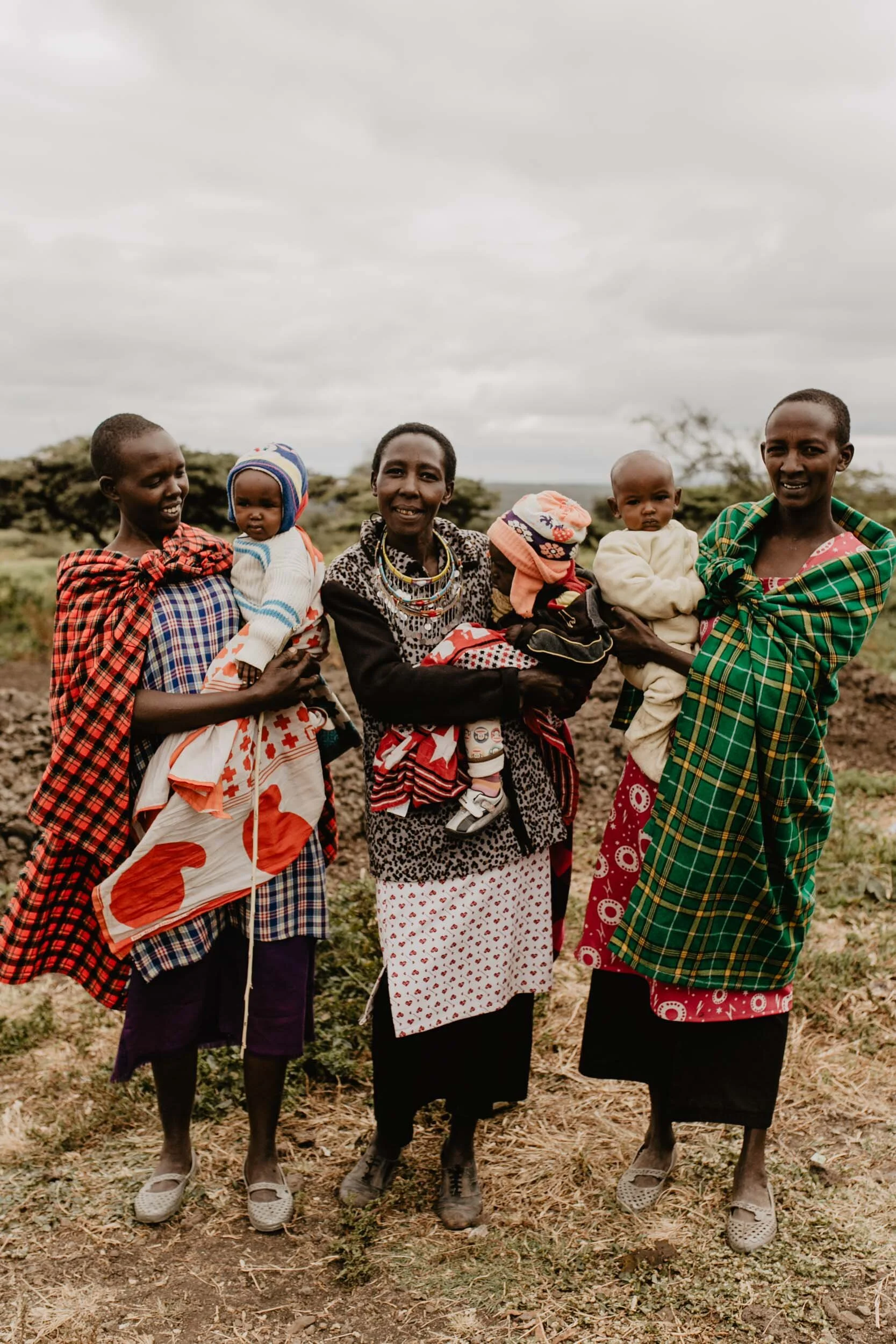 maasai women and their babies in kenya