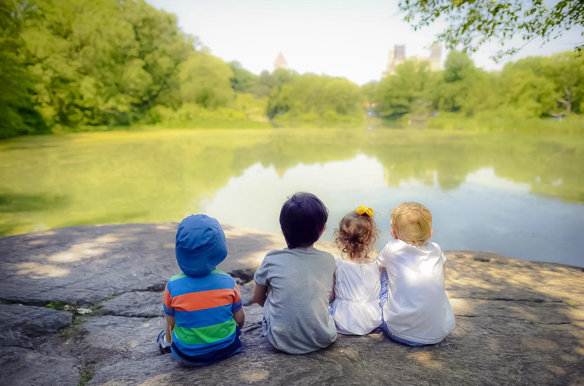 kids relaxing in central park. photo: google