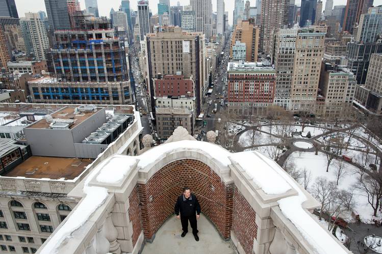 Sunny Atis, who has worked at the Flatiron building for 30 years and is now the superintendent, at the rooftop.