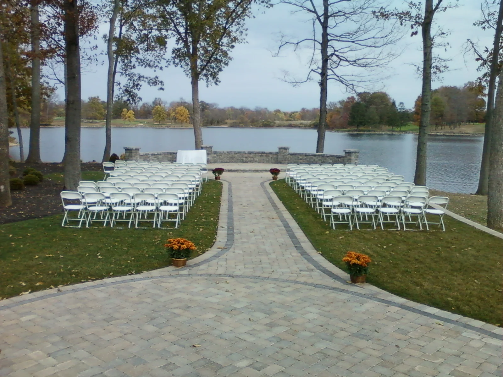 white sam.chairs ceremony set-up.jpg