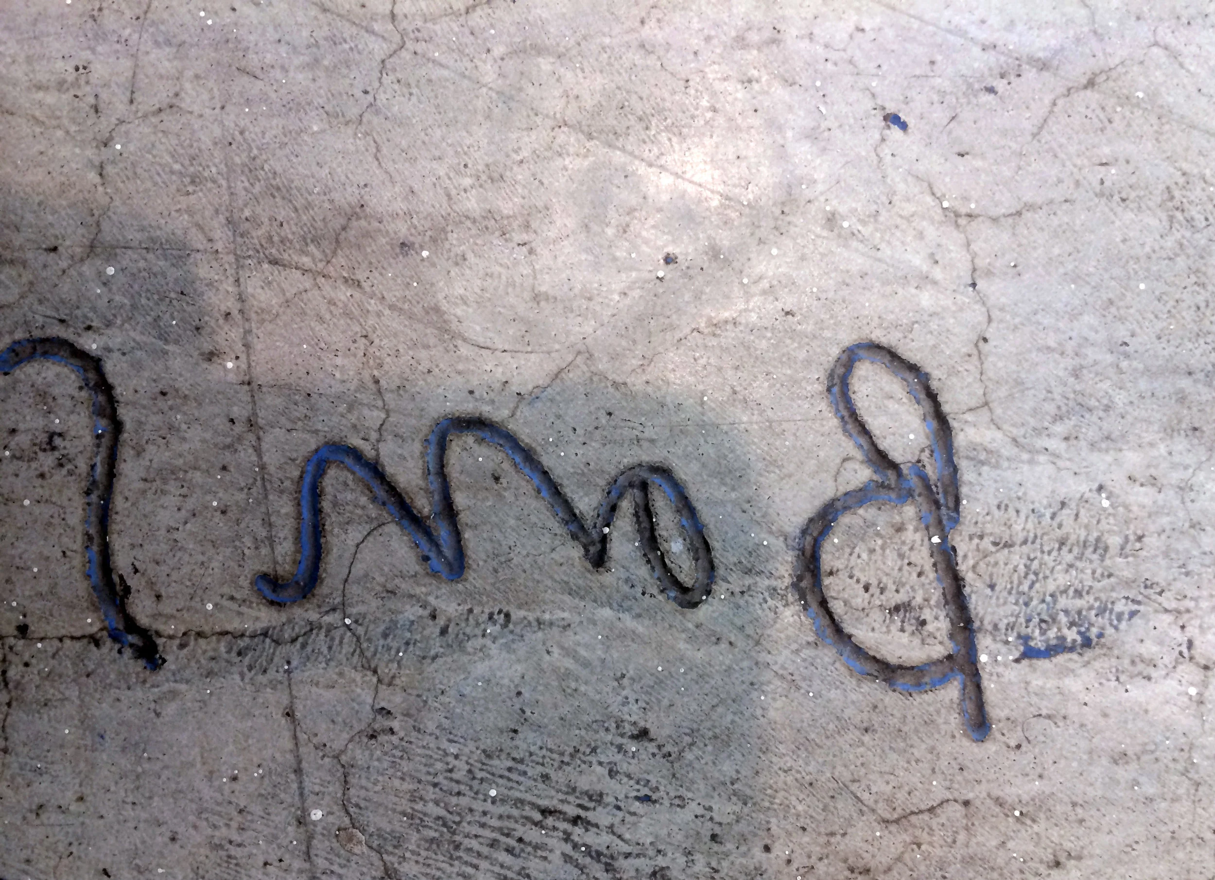Detail of artist's signature engraving