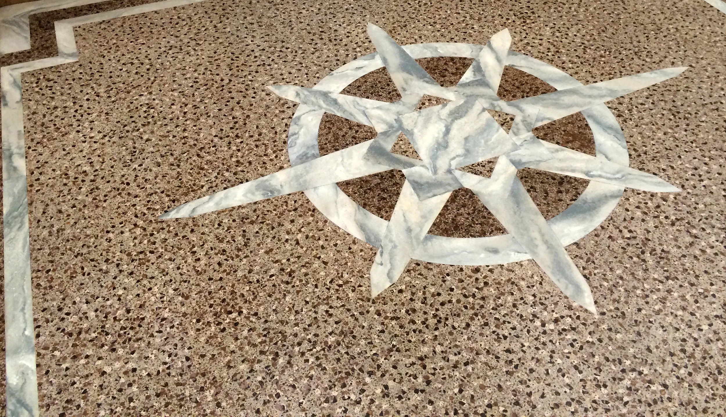 Faux marble and terrazzo floor seal for a network tv series