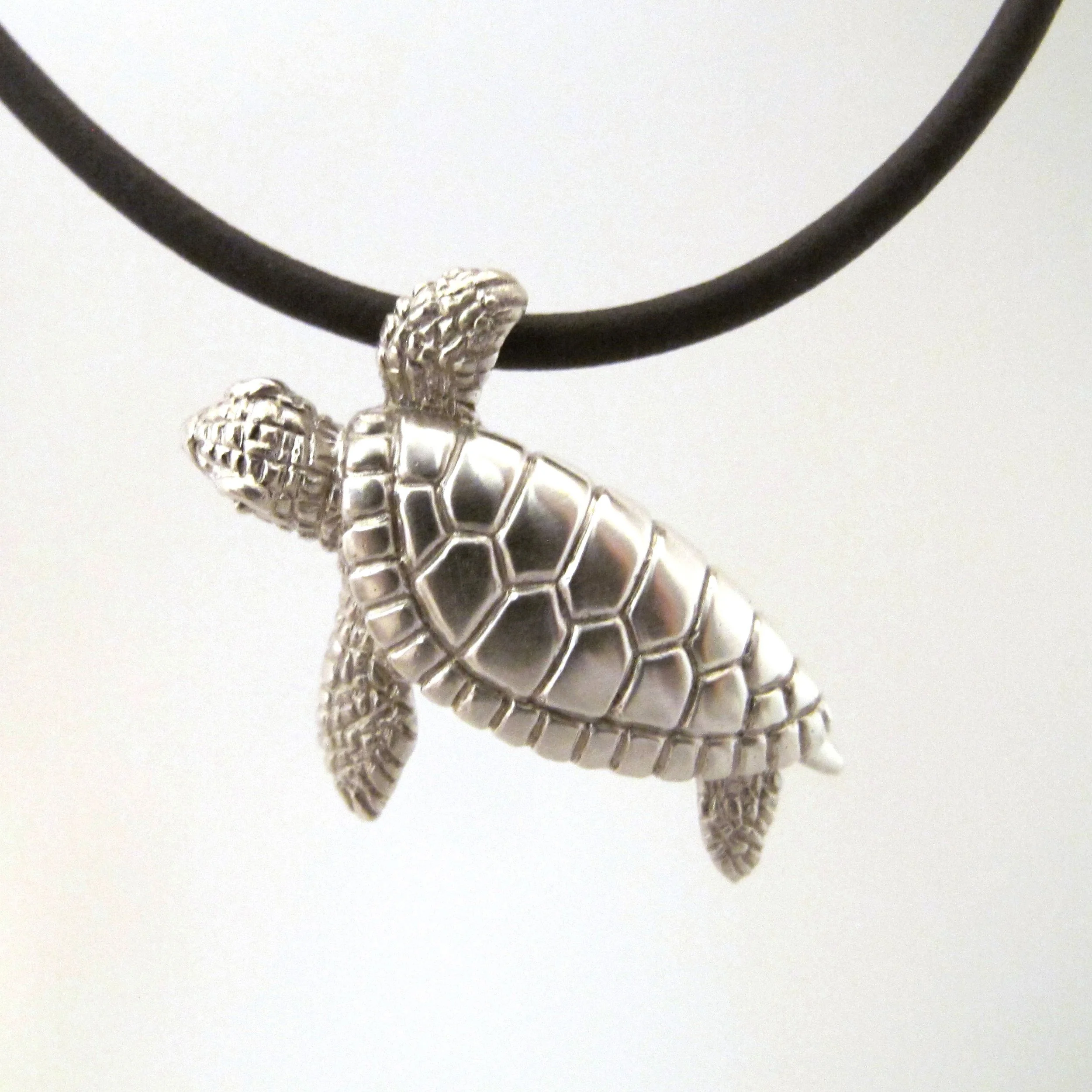 Silver Honu on black cord.jpg