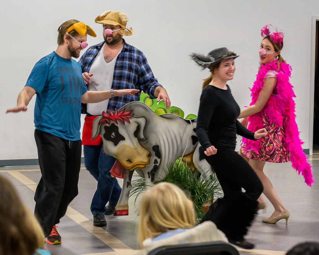  Zachary Angus as Larry Pig (far left); Brandon Evans as Fred Pig (center-left); Lauren Carter (center-right); Therese Pirçon as Susie Pig (far right)  Photo Credit: Roger David Manning 