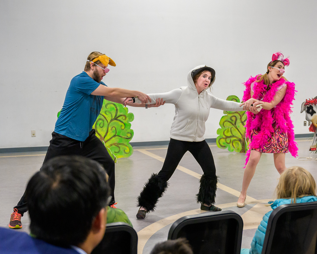  Zachary Angus as Larry Pig (left); Lauren Carter as the Wolf (center); Therese Pirçon as Susie Pig (right)   Photo Credit: Roger David Manning 