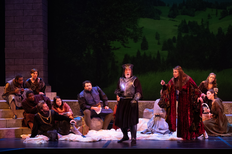  David Paul Mosedale as Pellinore (center); Marci Jackson as Guenevere (right); Indianapolis Opera Chorus  Photo Credit: Denis Ryan Kelly, Jr. 