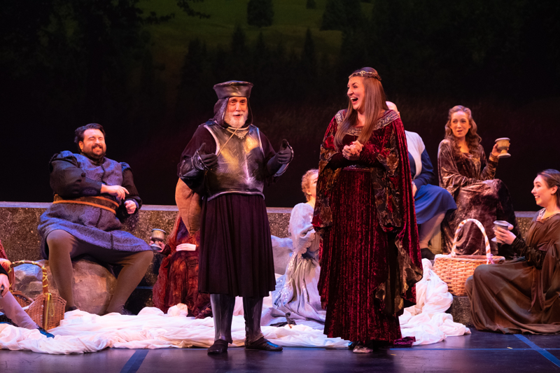  David Paul Mosedale as Pellinore (center); Marci Jackson as Guenevere (right); Indianapolis Opera Chorus  Photo Credit: Denis Ryan Kelly, Jr. 