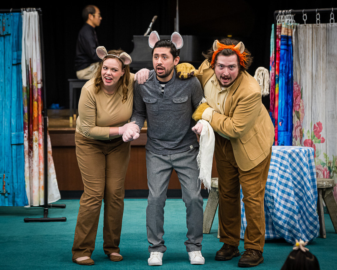  Janese Pentico as the Country Mouse (left), Felipe Prado as the City Mouse (center), and Alexander Henderson as the Lion (right)  Photo Credit: Roger David Manning. 