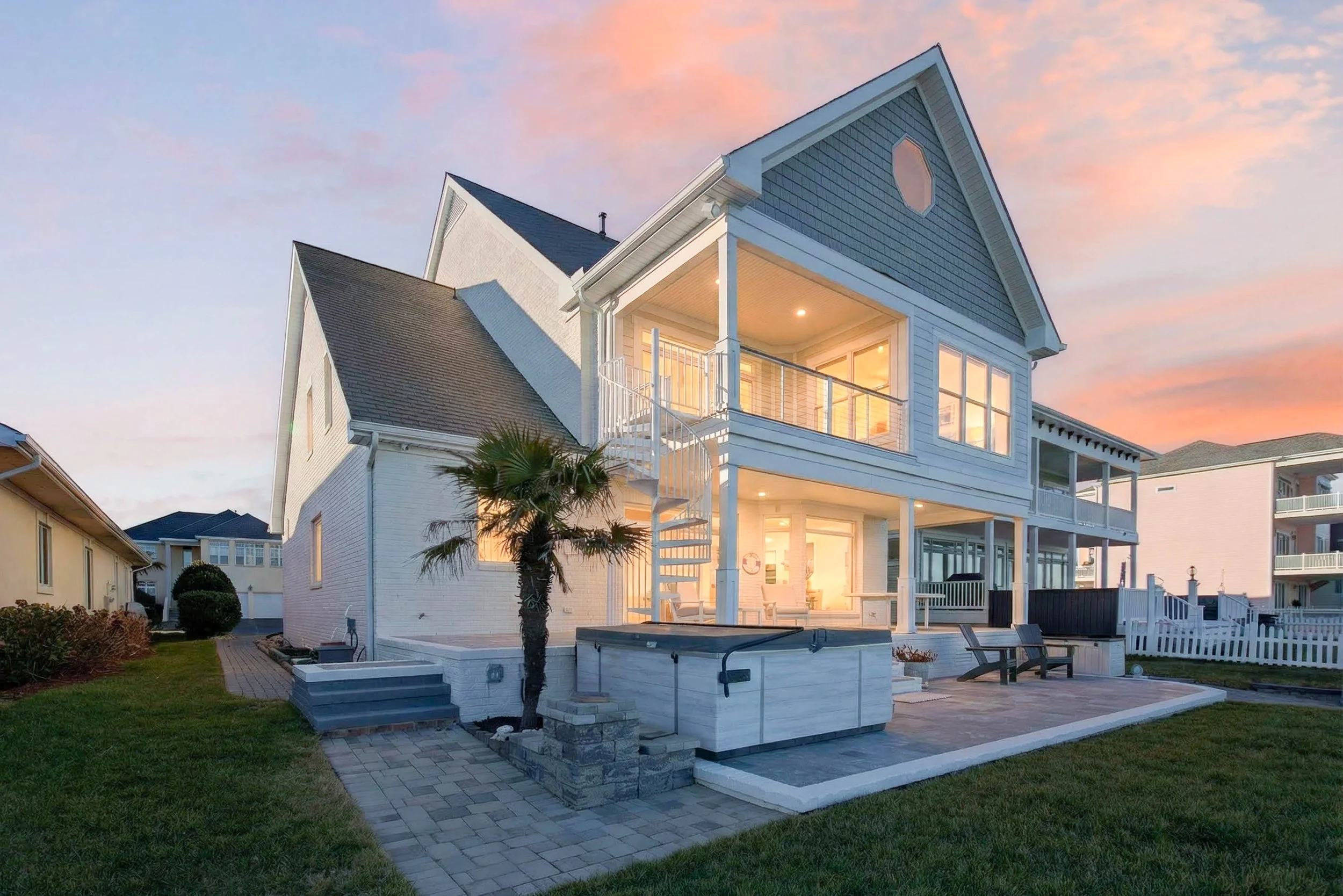 14 bay front place sunset rear elevation.jpg