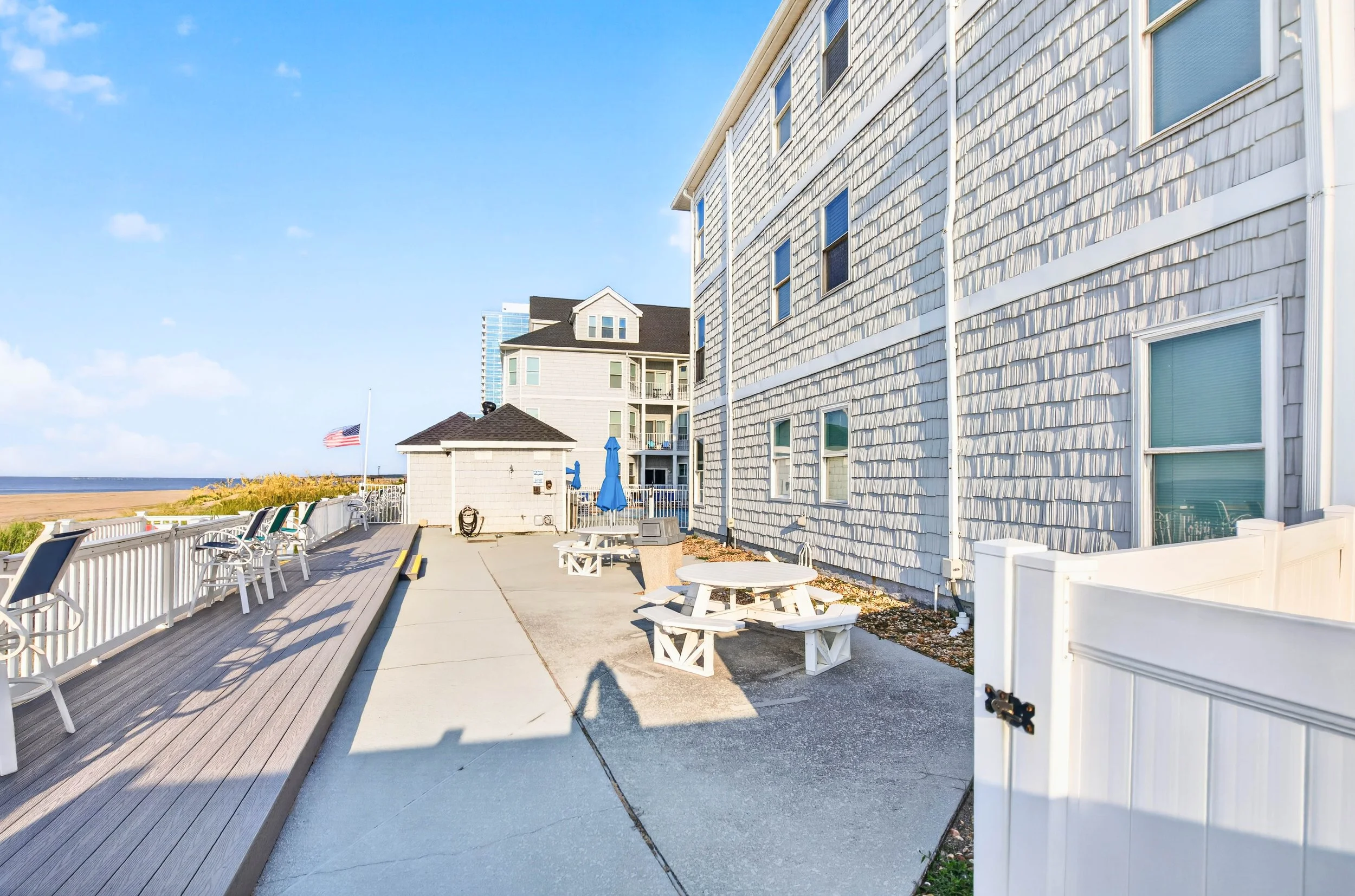 A community outdoor kitchen and gas grills make it easy to bring meals and gatherings closer to the Bay.