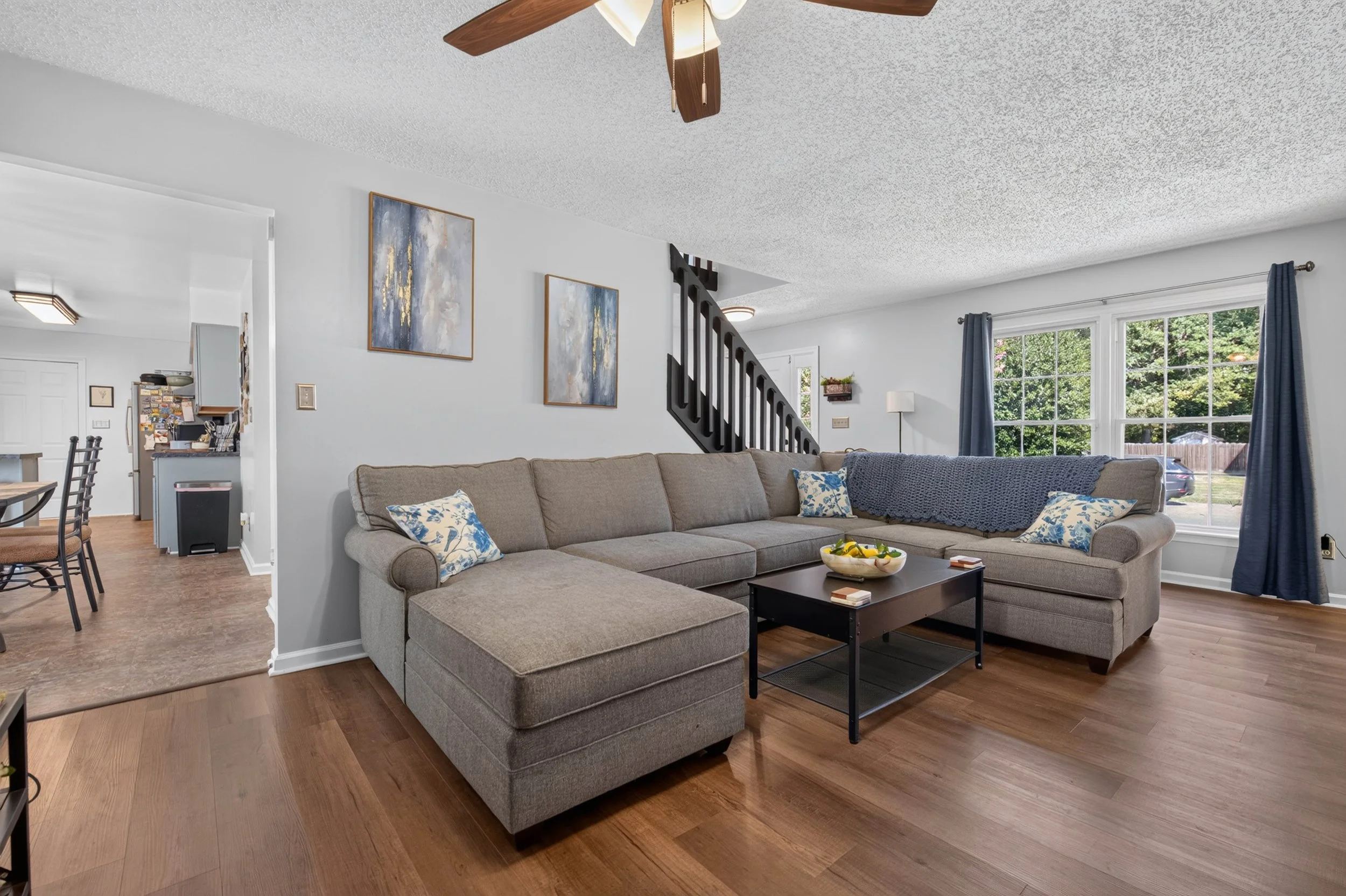 The living room connects to the dining area while still feeling like a room of its own.