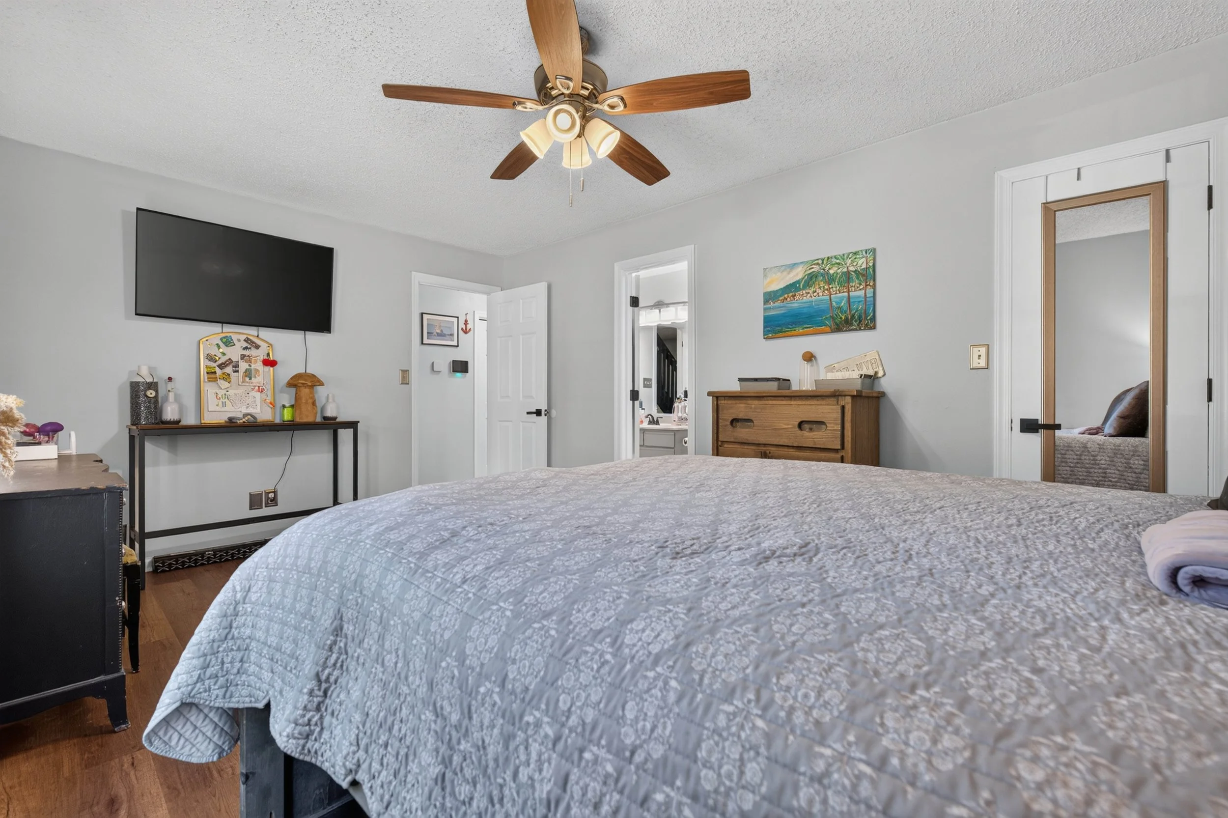 A wider view shows the overall size and layout of the first-floor primary bedroom.