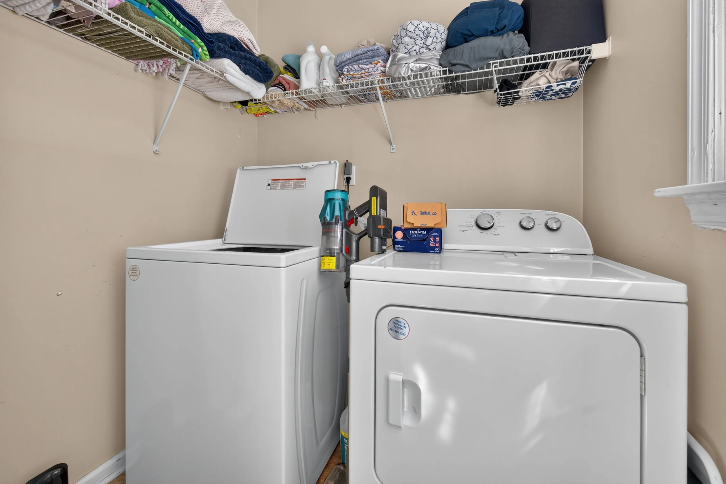 A dedicated laundry area keeps the washer and dryer out of the main living spaces.