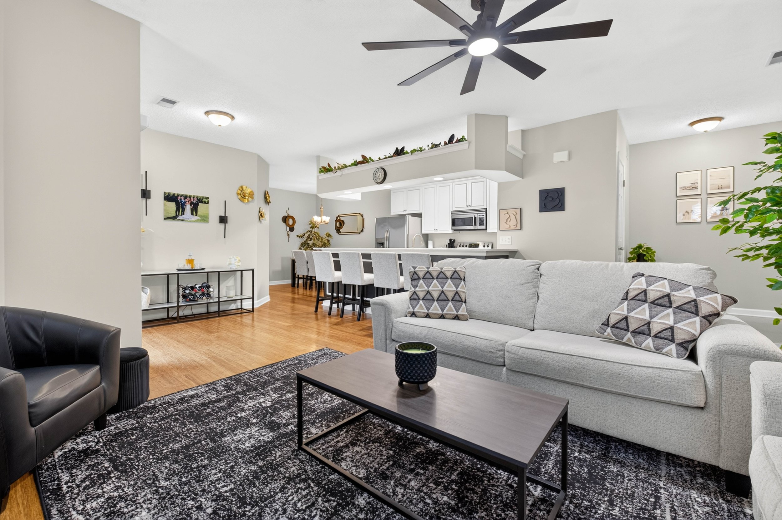 The spacious living room offers room to settle in, with the gas fireplace keeping the atmosphere warm and grounded.