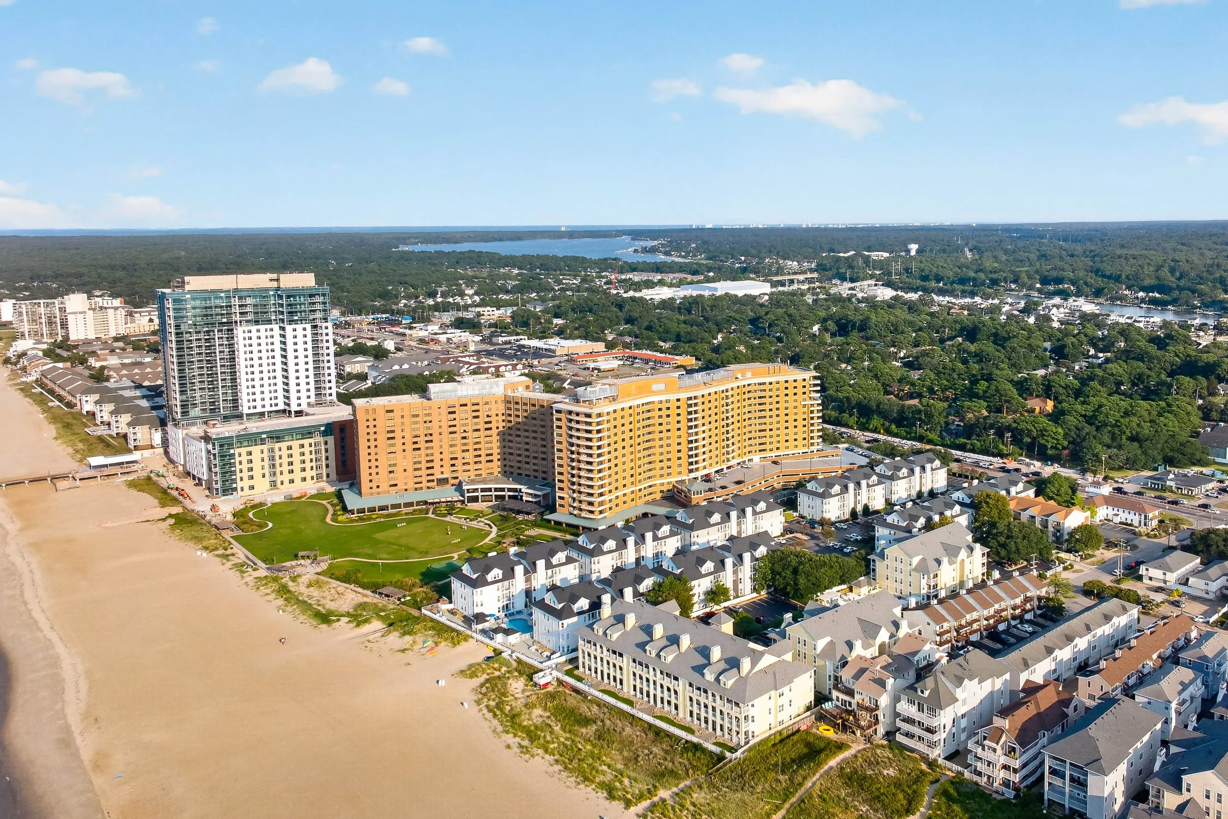 This aerial perspective captures the lifestyle at a glance: home, beach and Chesapeake Bay within the same coastal frame.
