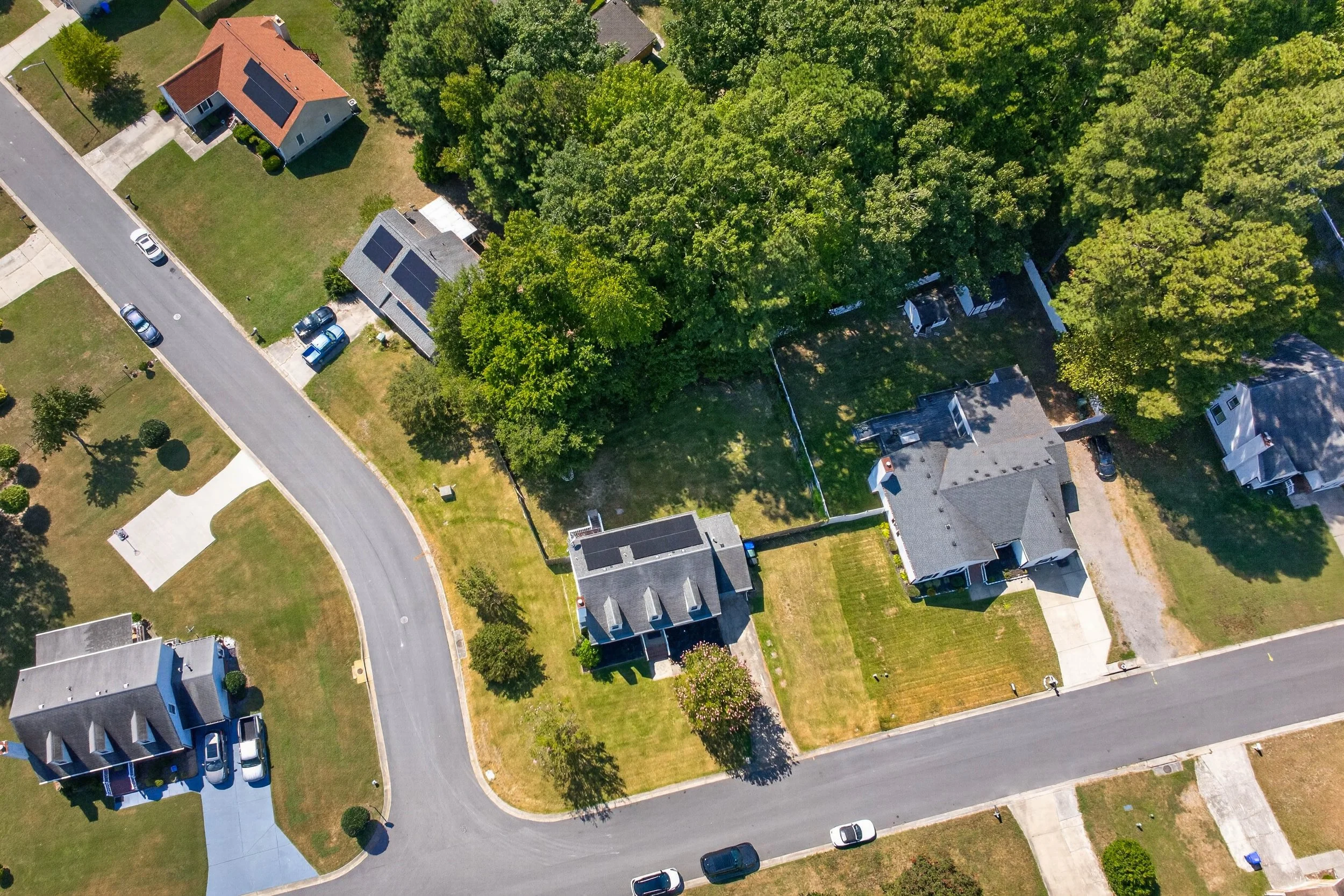 Aerial view of the streets and homes immediately surrounding 811 Haskins Drive in Suffolk, Virginia.