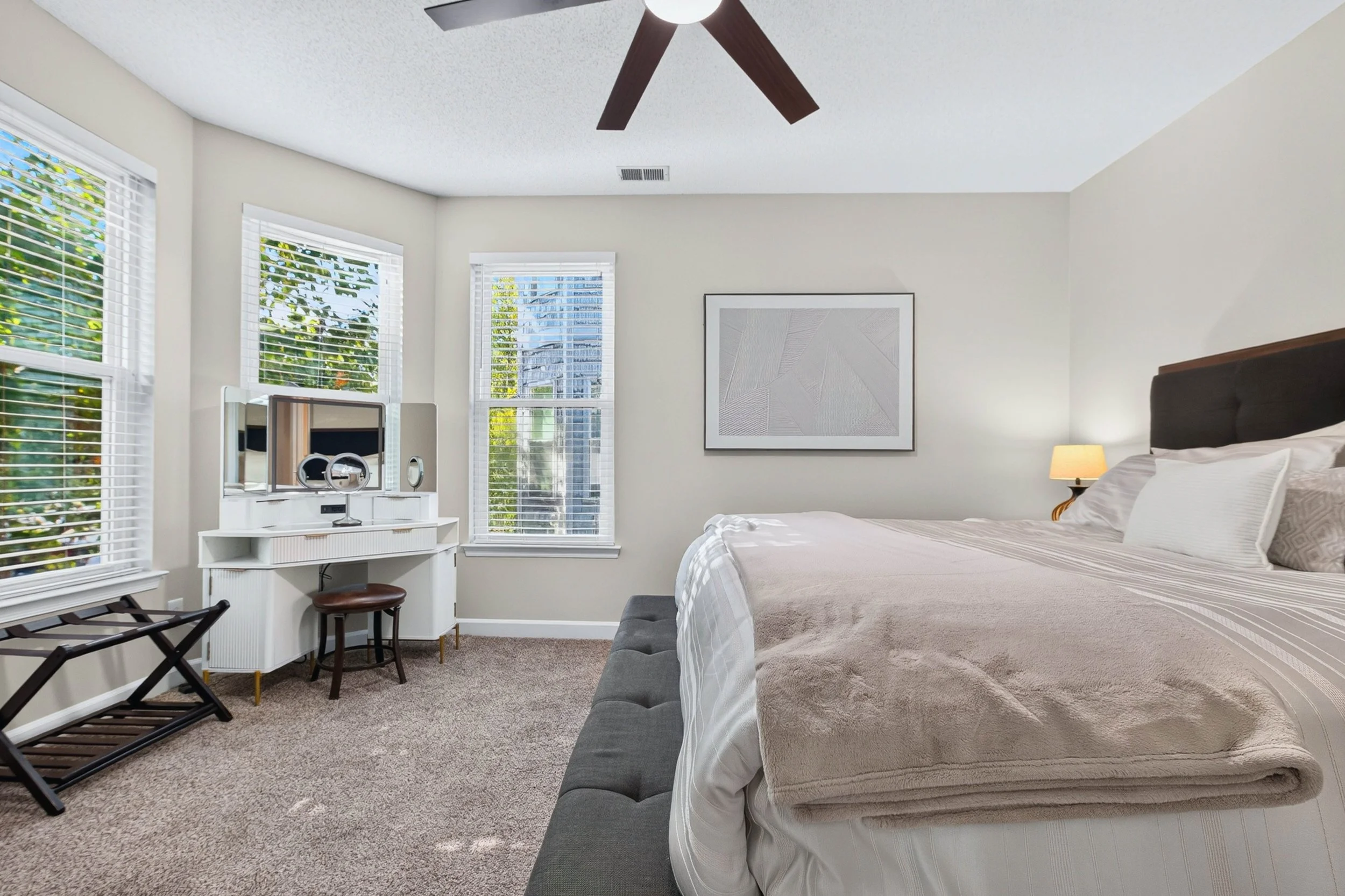 This windowed corner offers space for morning routines, a little work or an unhurried cup of coffee.