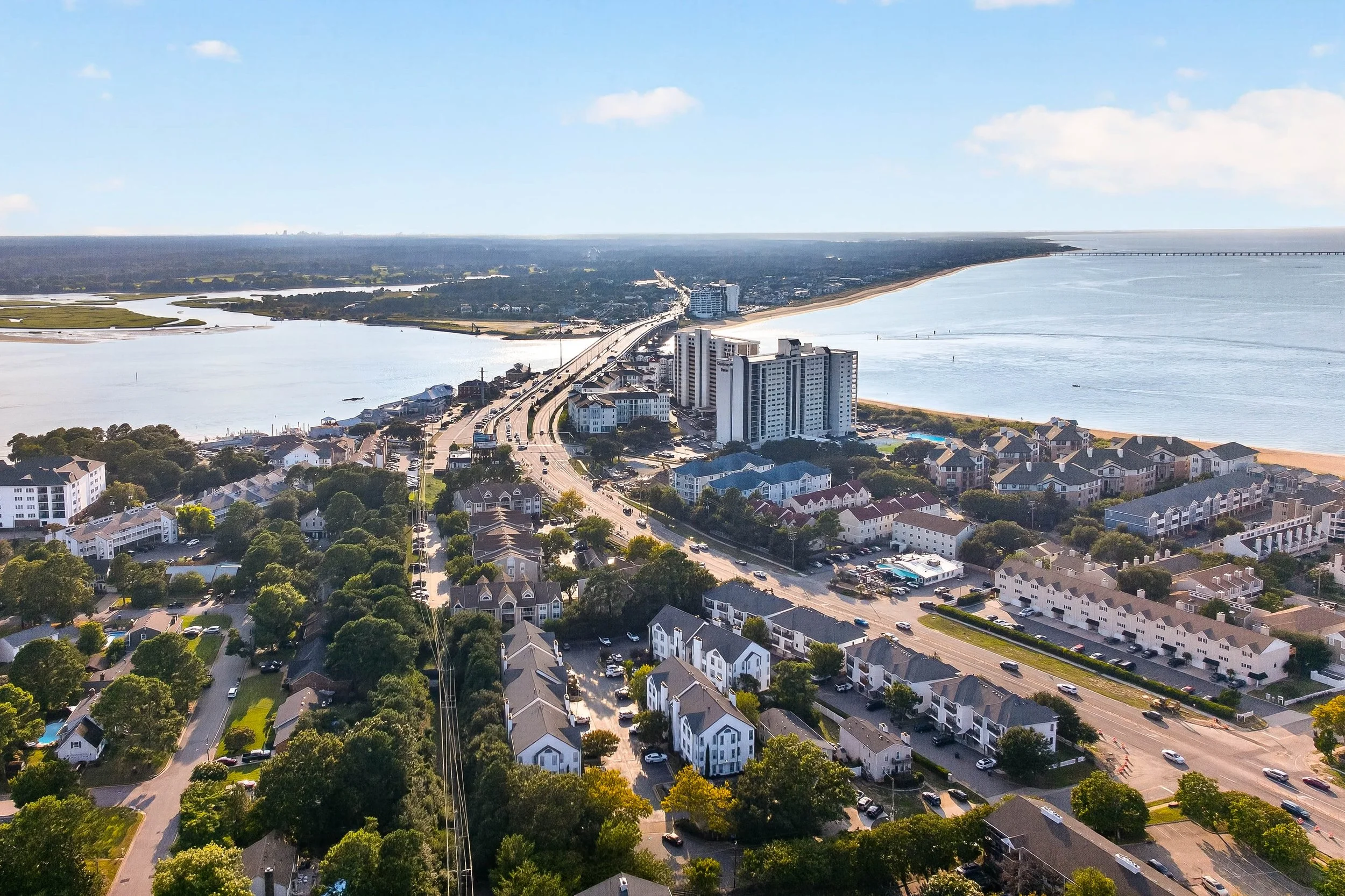 This aerial view captures the larger Shore Drive setting, including Lynnhaven Inlet, the bridge, coastline and Chesapeake Bay.
