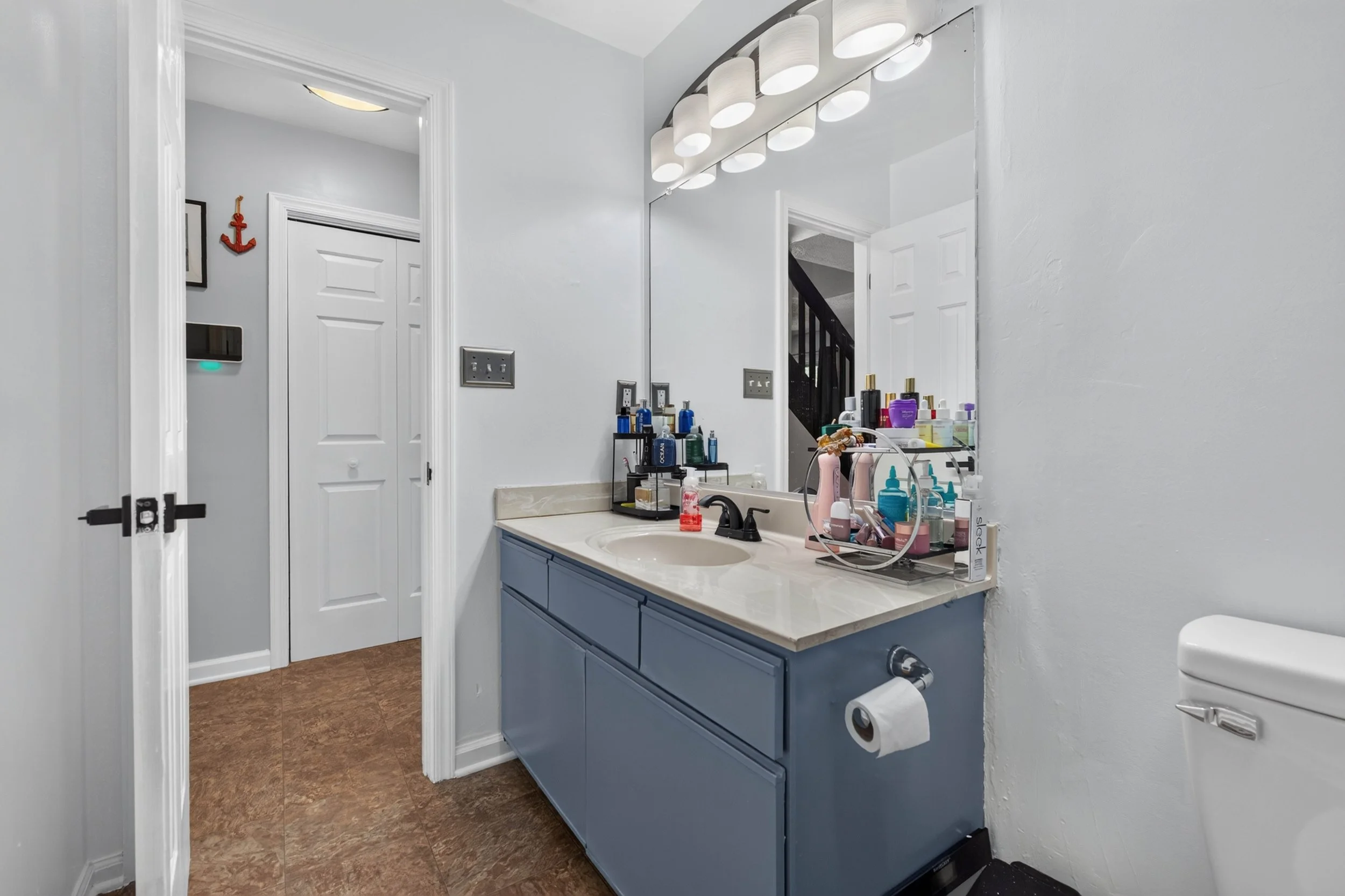 The full bathroom is located on the main level near the first-floor primary bedroom.