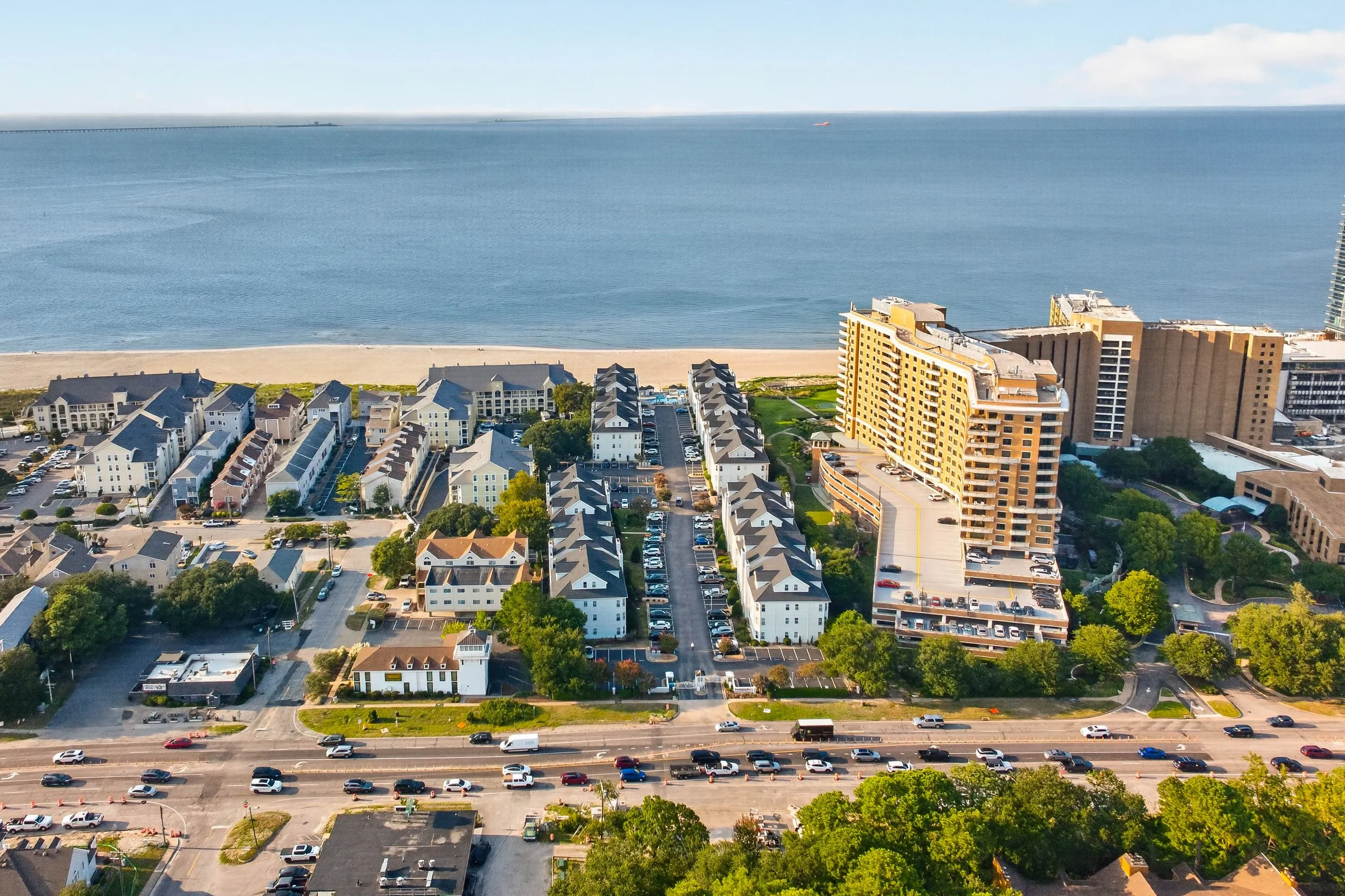The shoreline becomes part of the community experience, bringing the Chesapeake Bay into the rhythm of life at Lynnhaven Beach.