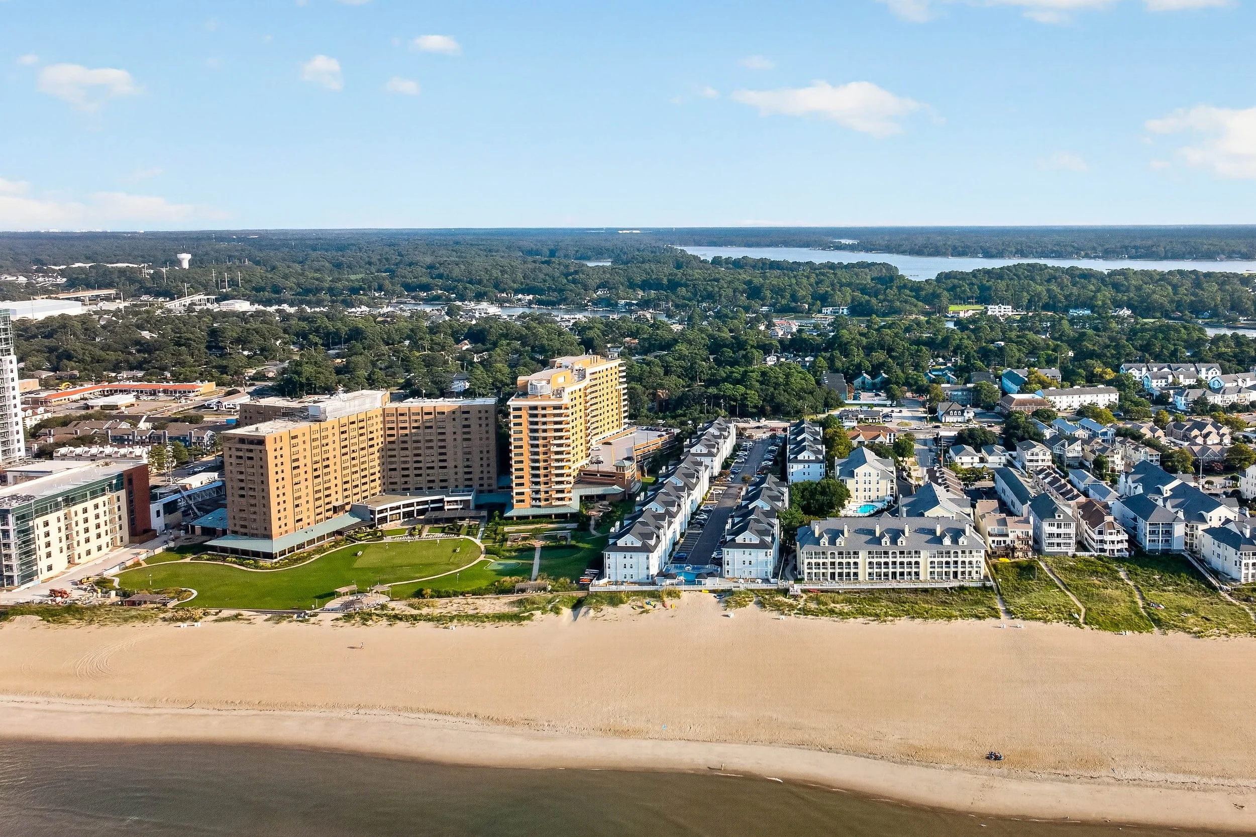 From above the Bay, the beach and Lynnhaven Beach community come together as one connected shoreline setting.