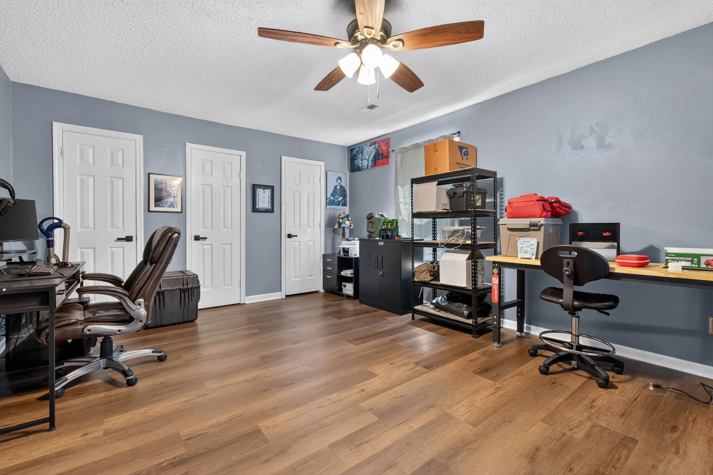 One upstairs bedroom is currently arranged as a home office, showing another way the room can be used.