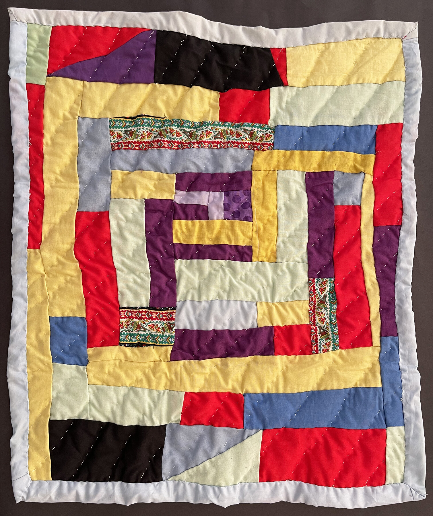   Stella Mae Pettway    Improvisational quilt, 2021.   21” x 19”  Cotton fabrics  Hand-pieced, hand-quilted    ASK ABOUT THIS QUILT   