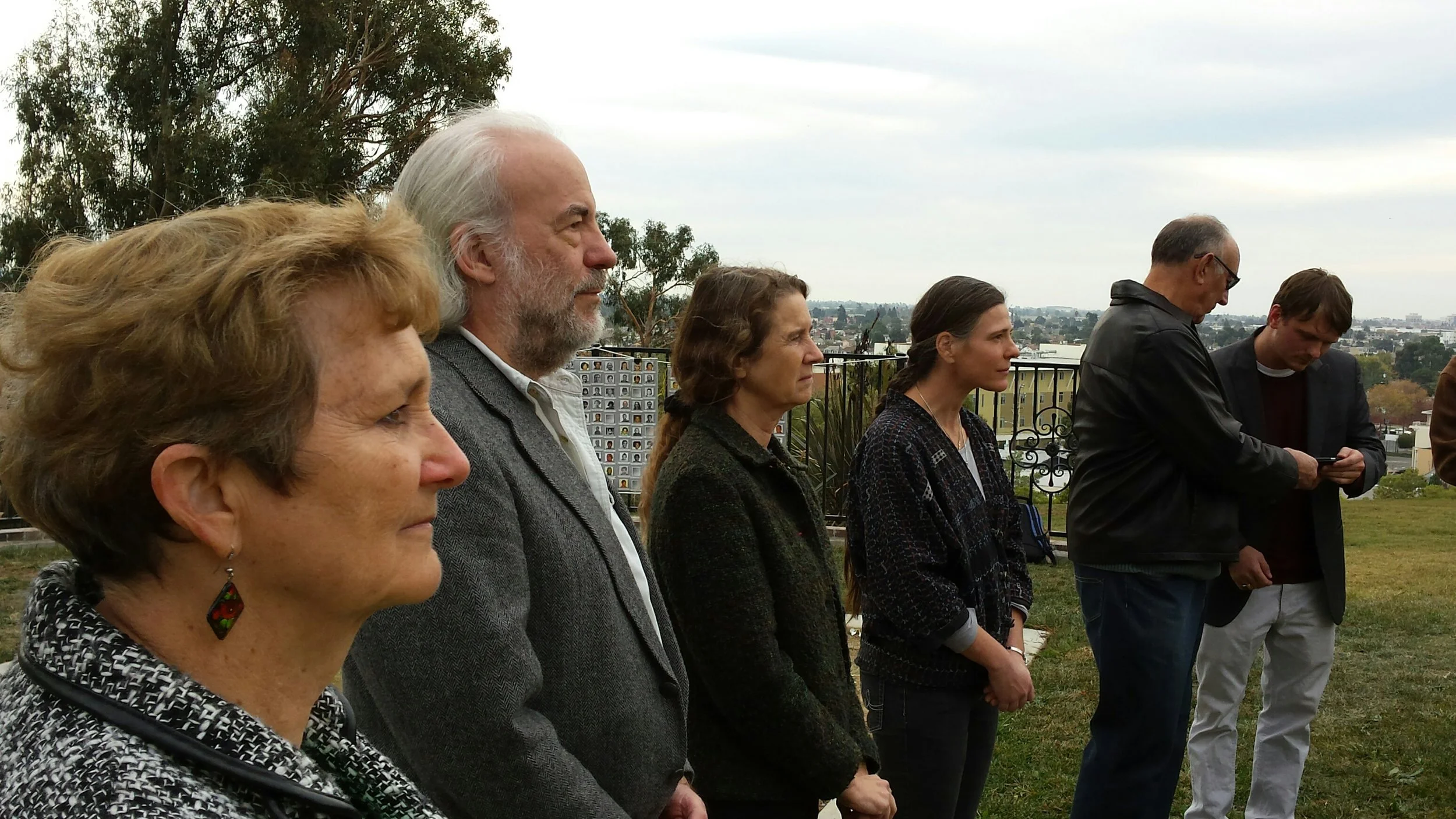 Laura Johnston Kohl (far left) at the 36th anniversary gathering at Evergreen Cemetery in Oakland, CA, on November 18, 2014. Photo courtesy of Laura Johnston Kohl via Peoples Temple/Jonestown Gallery (Flickr)