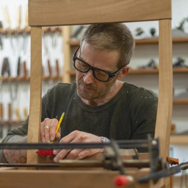 William Graeber of Graeber Design working on a custom chair