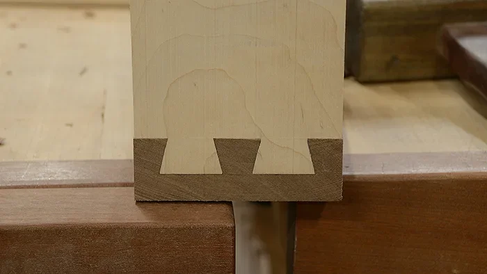 a perfect hand-cut dovetail joint on a drawer side