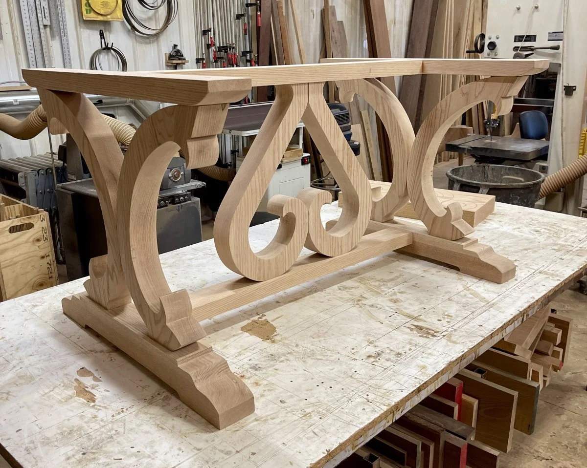 An incredible little custom table base getting it's final shaping and sanding