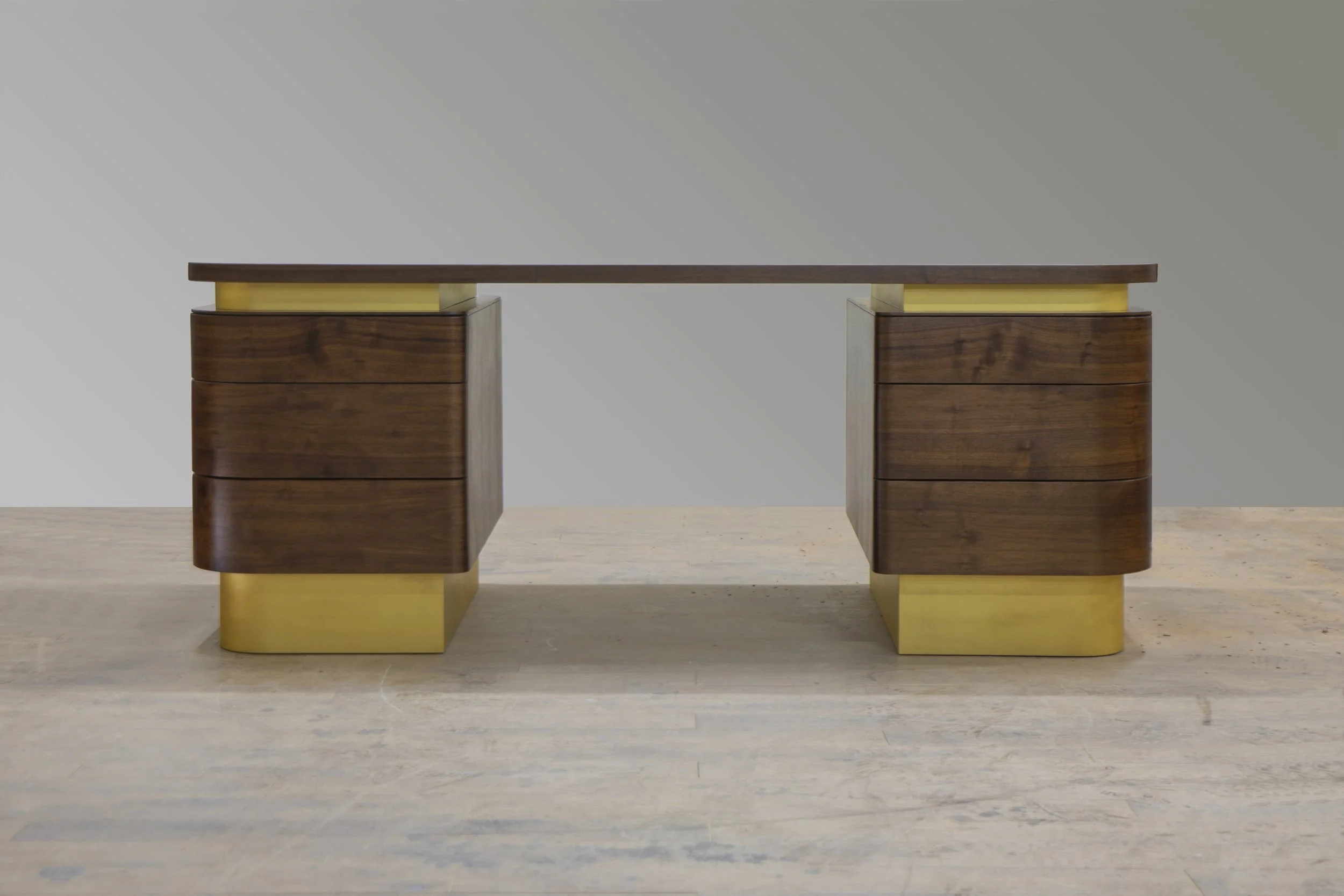 Custom Walnut Desk with with hand-cut dovetail drawers and Gold Accents