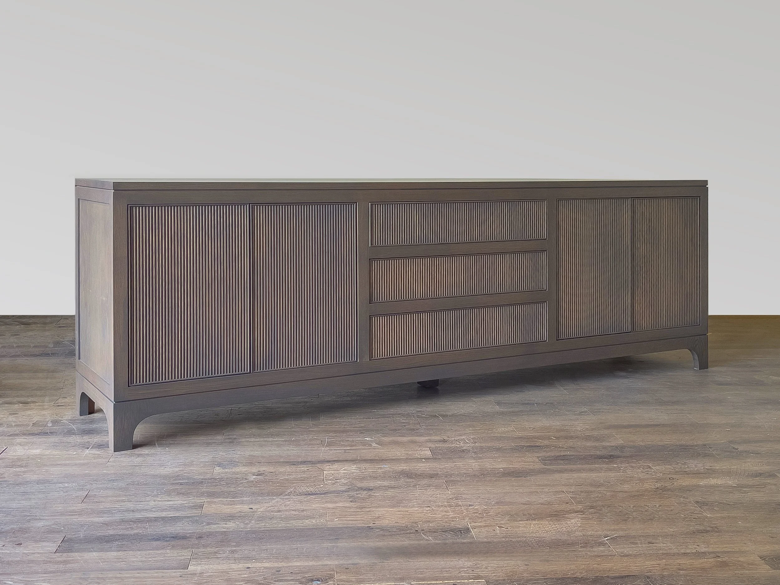 White oak buffet with reeded fronts