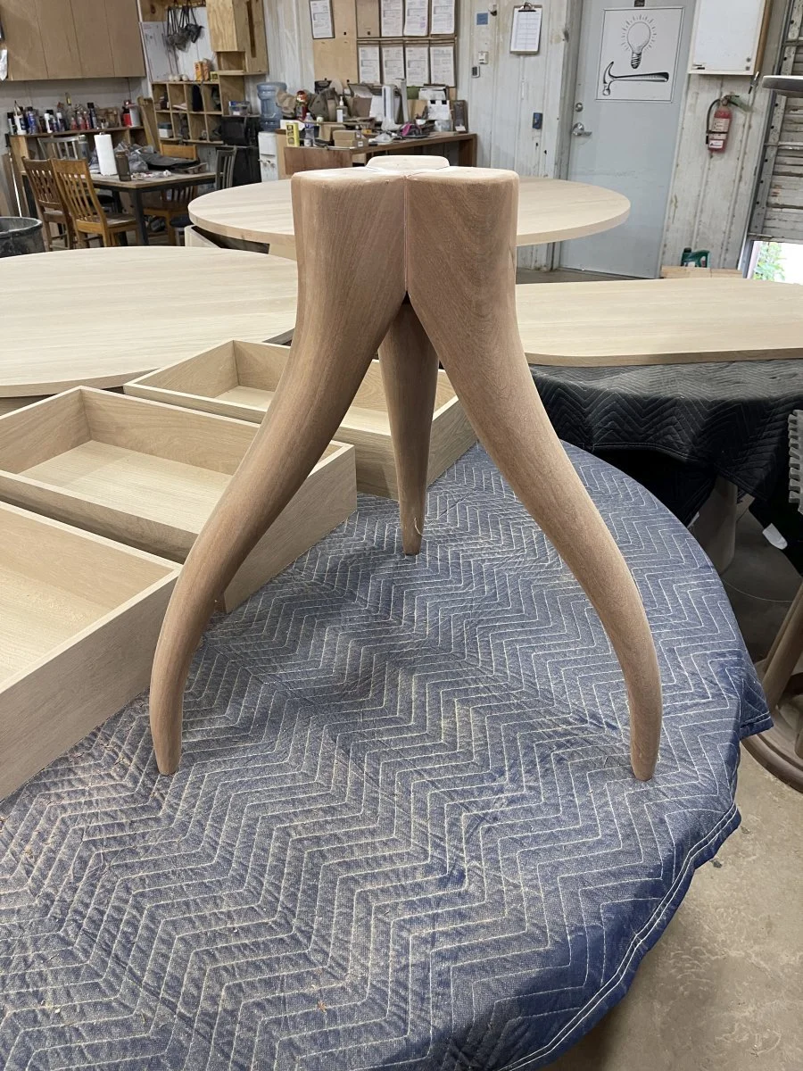 one of my hand-carved tri-leg bases waiting to go in the booth for finishing