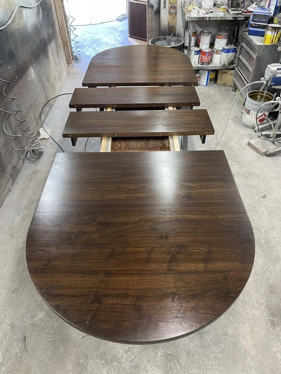 A complete Phyfe inspired table in the booth getting its final coats of catalyzed lacquer