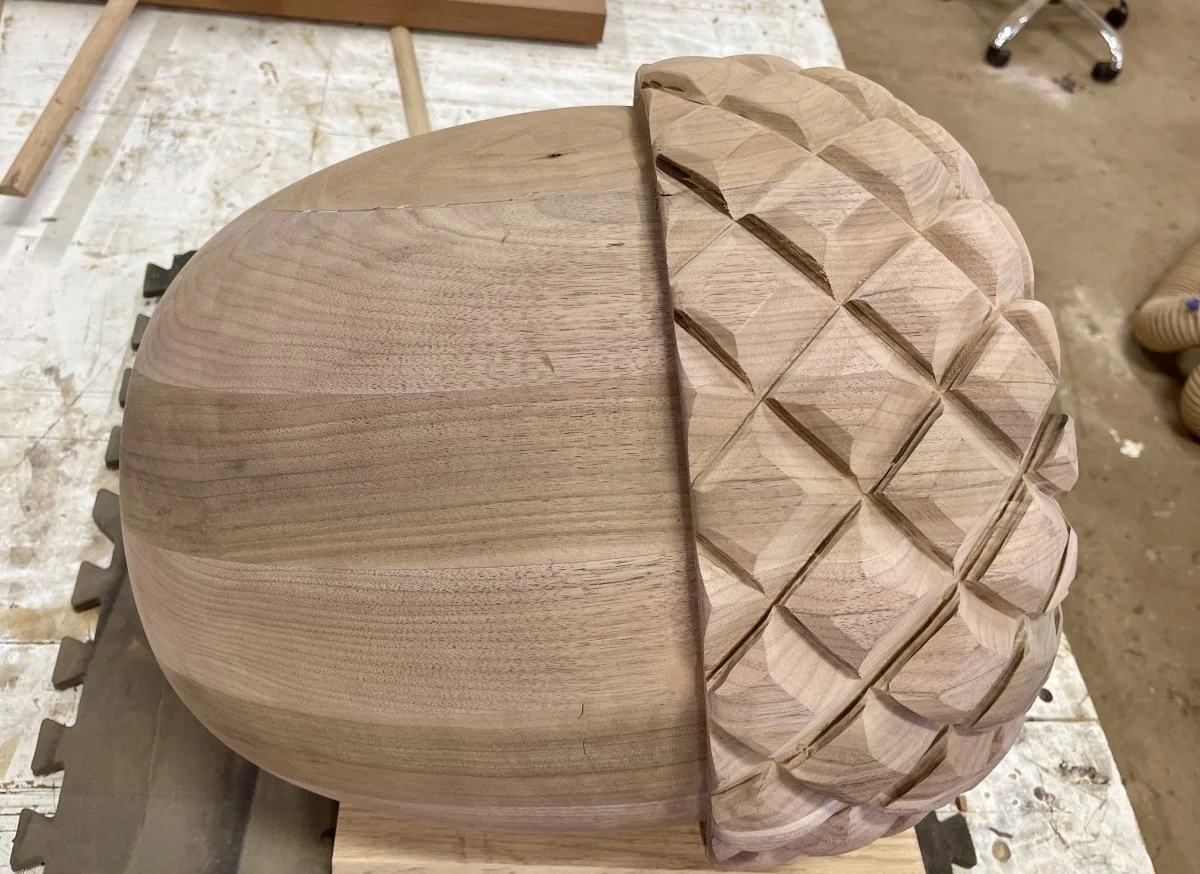 my hand-carved acorn base during it's shaping and sanding phase